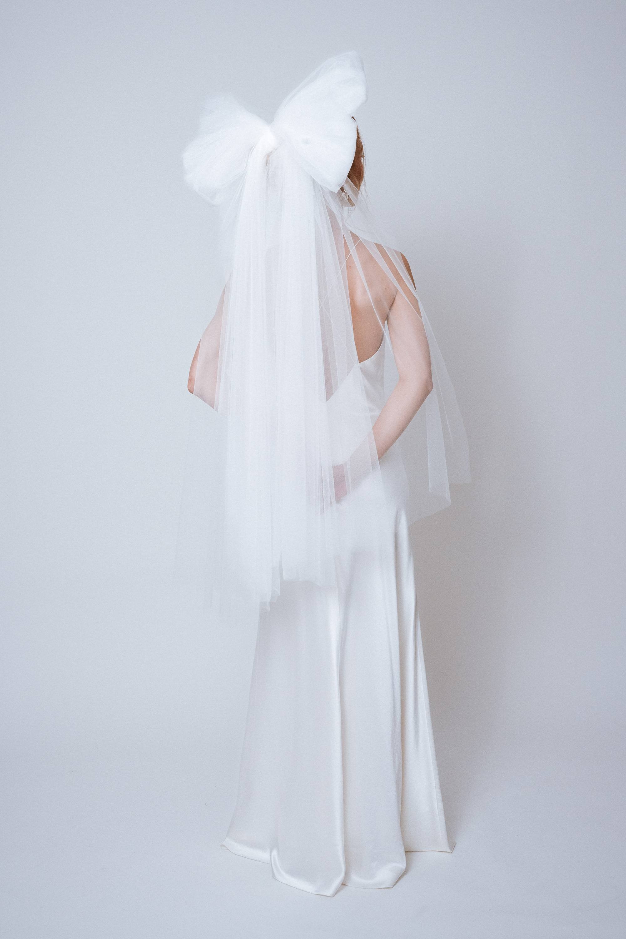 Back view of the Statement Bow Veil highlighting volume and bow structure