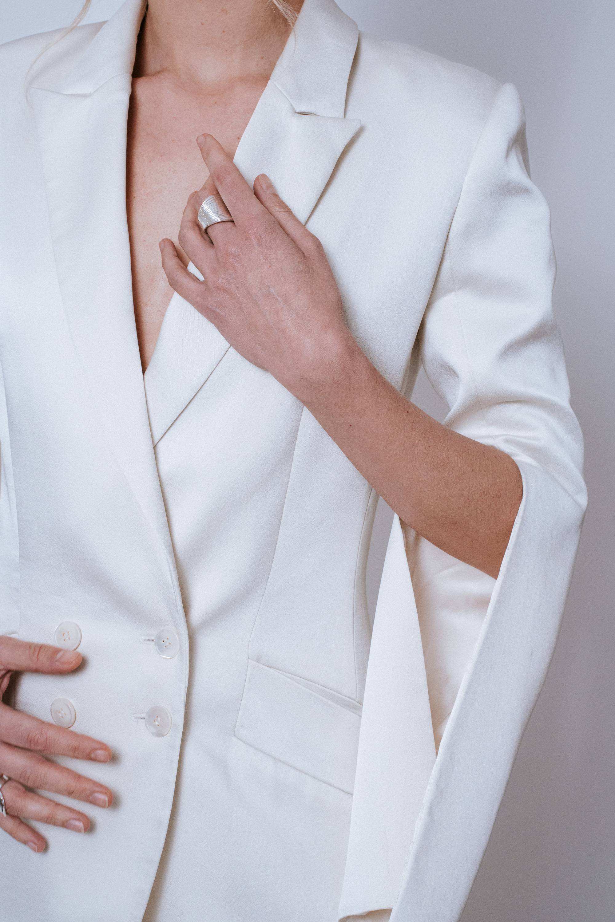 Close-up of lapel collar and structured neckline