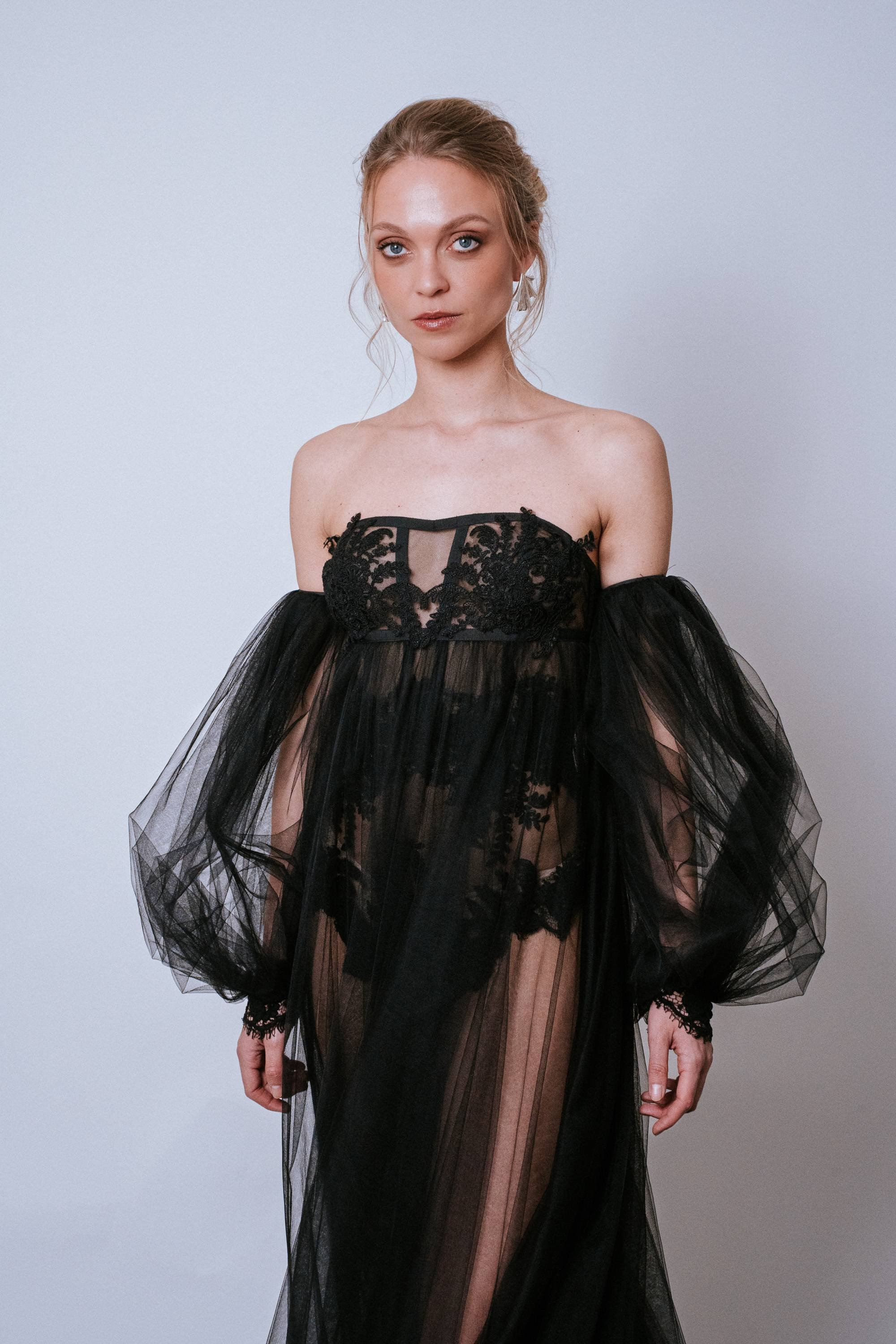 Front close-up of the black Shadow Gown with lace bodice and tulle layers