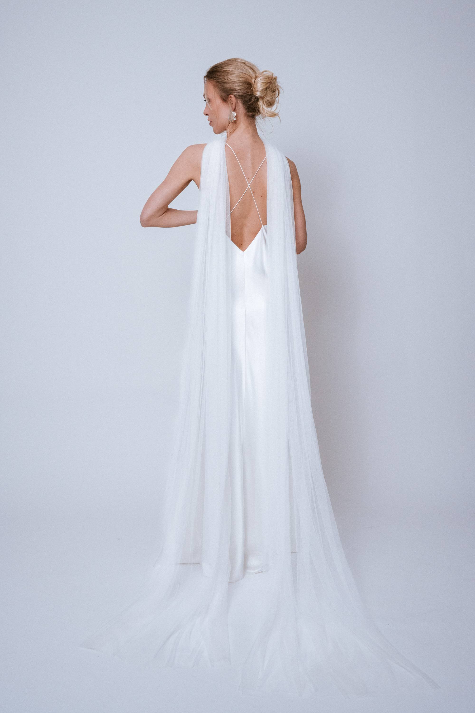 Back view of the Softtulle Scarf with both ends trailing down the back, creating a modern veil effect