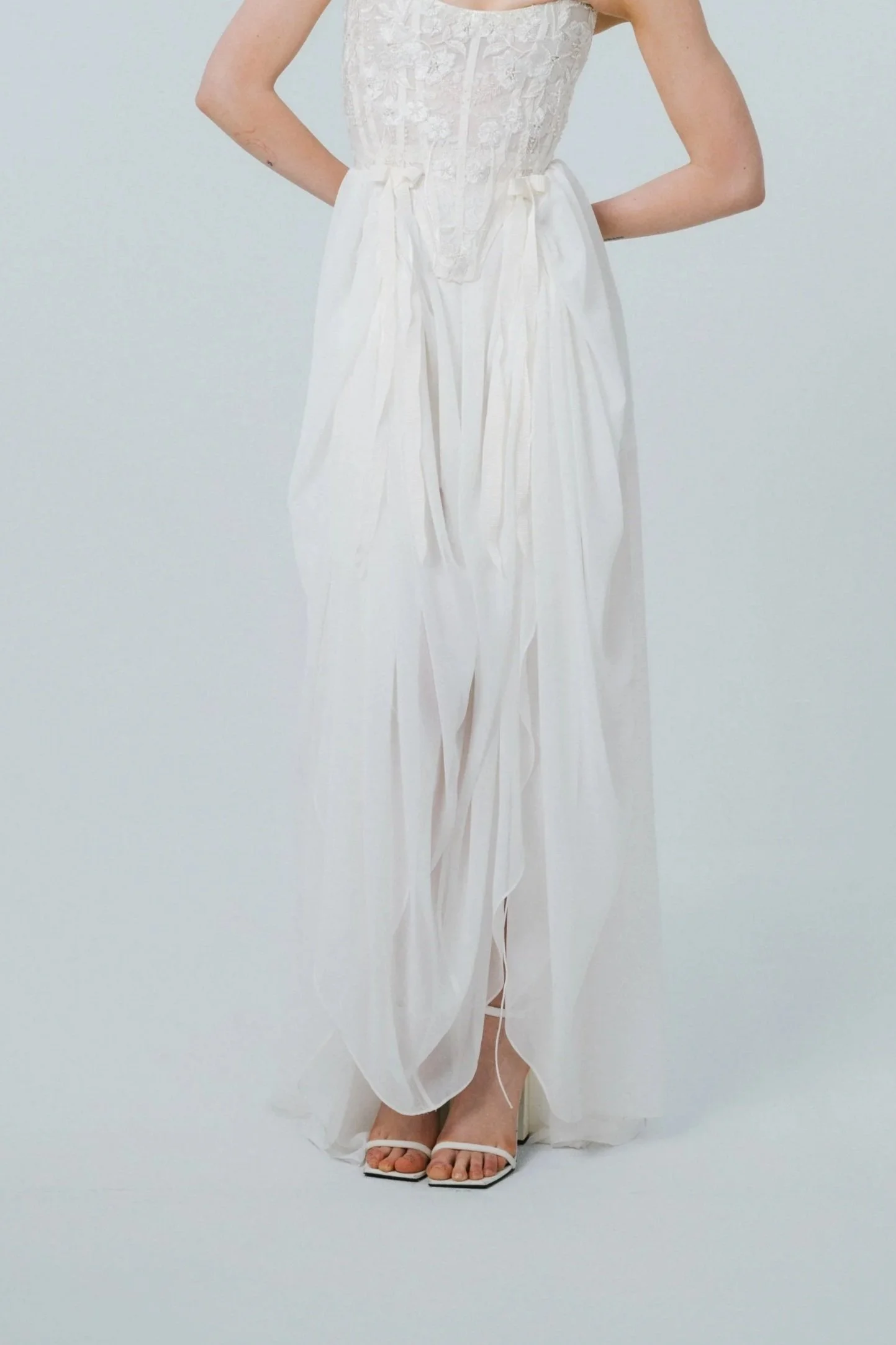 Flowing ivory chiffon bridal skirt with gathered draping and front slits
