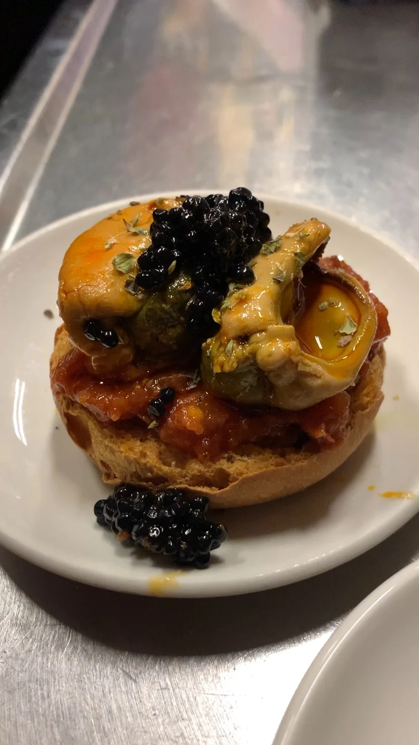 Mussels with caviar and sweet tomatoes