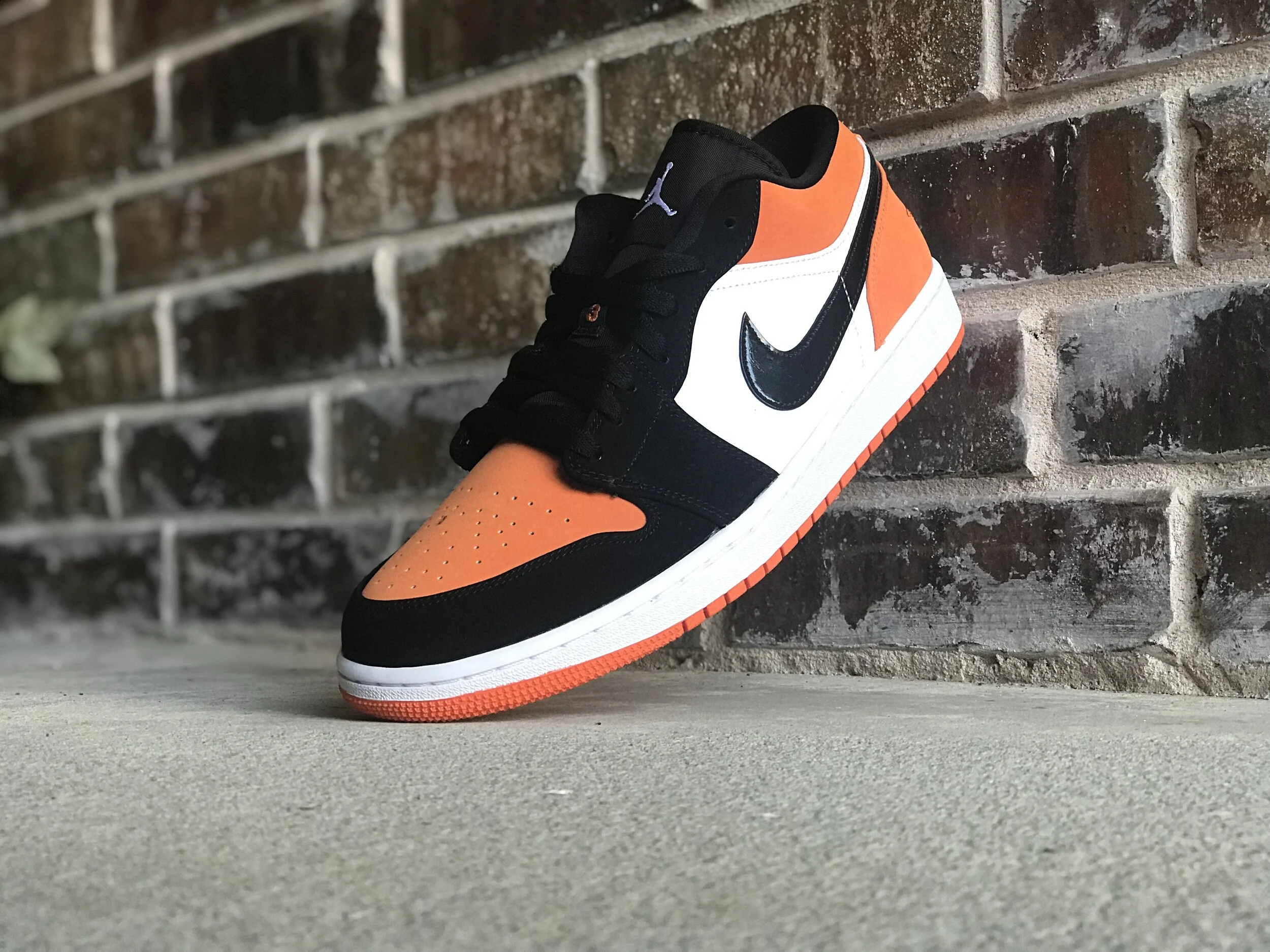 jordan 1 low shattered backboard on feet