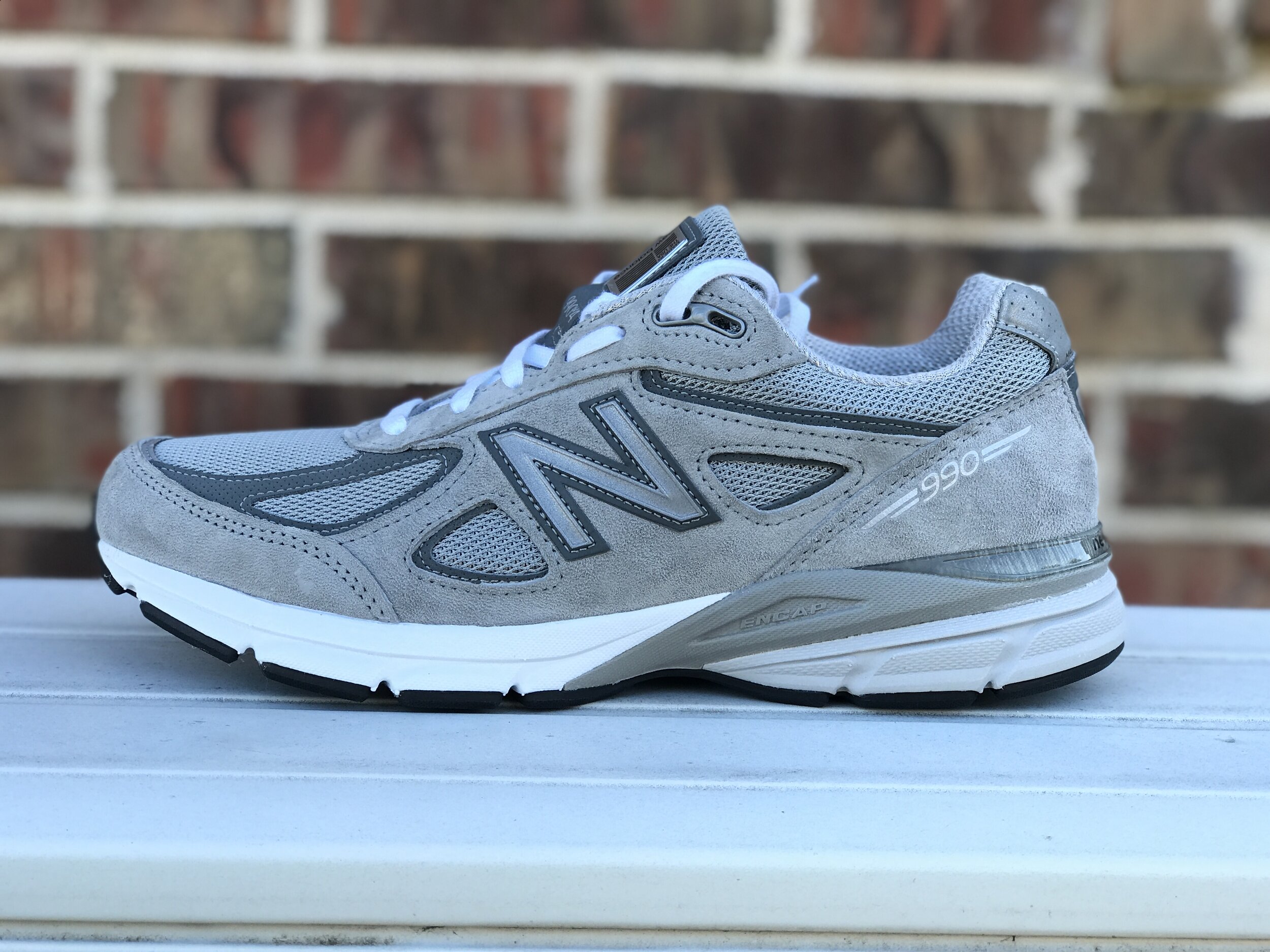 new balance 990v4 grey on feet