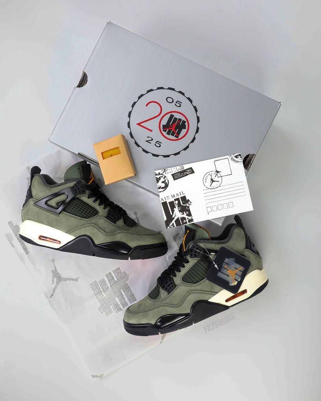 Undefeated-Air-Jordan-4-2025-Deep-Green-Clementine-IB1519-200.png