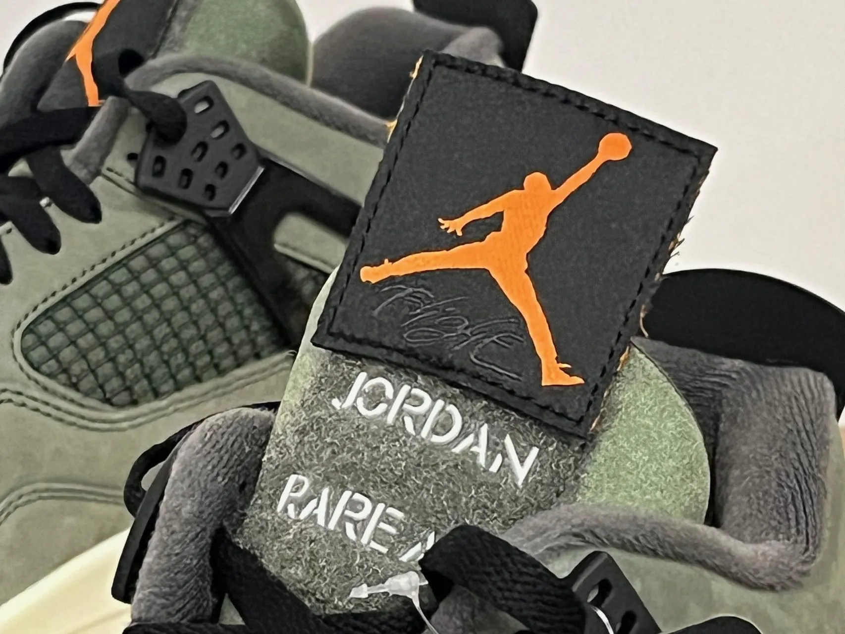 Undefeated-Air-Jordan-4-Jumpman-Tag-2025.png