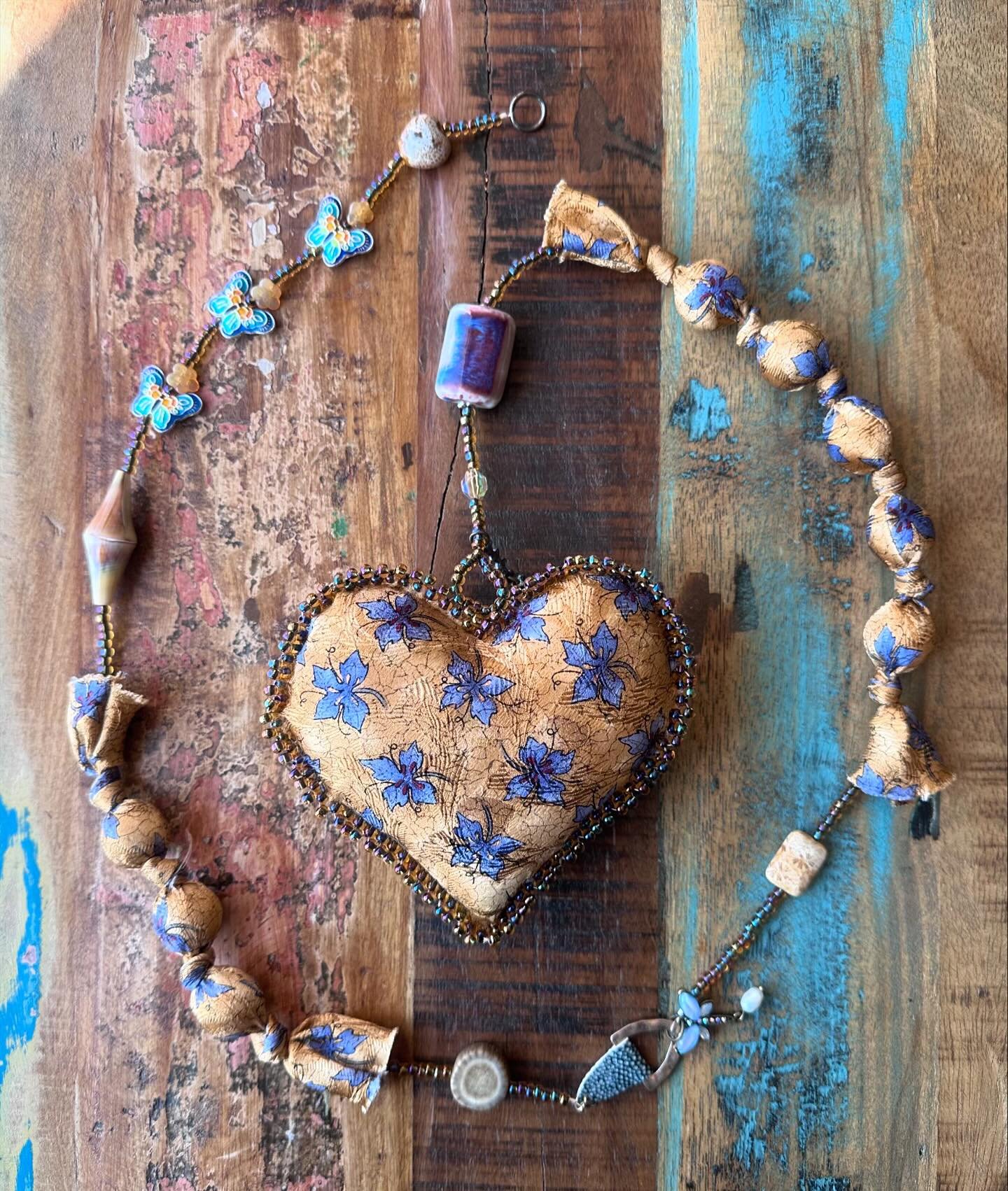 The hearts for my girlfriends have the beautiful tie silk on one side and they are backed with leather. The small hearts I used to stitch were cut out of leather and I Iove the feel of sewing through it. It requires special needles that are strong en