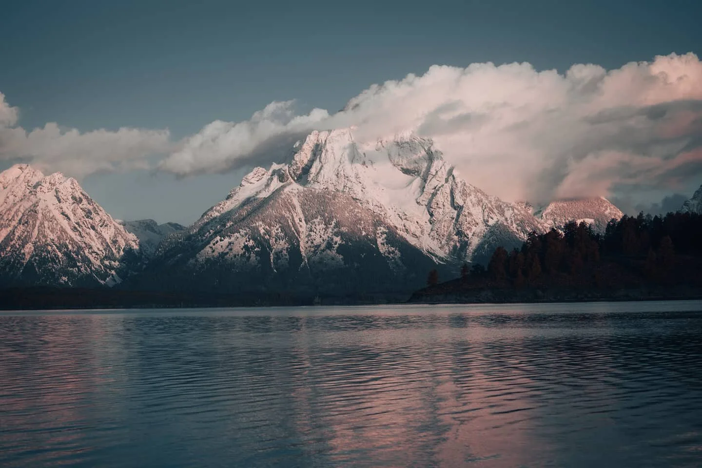 Another dramatic shot of the sunrise colors of the Tetons mornings produce these glassy lakes and fantastic colors. During the trip, this was the closest we got to a clear view of the mountains, but if you ask me, the trailing clouds add a lot of tex