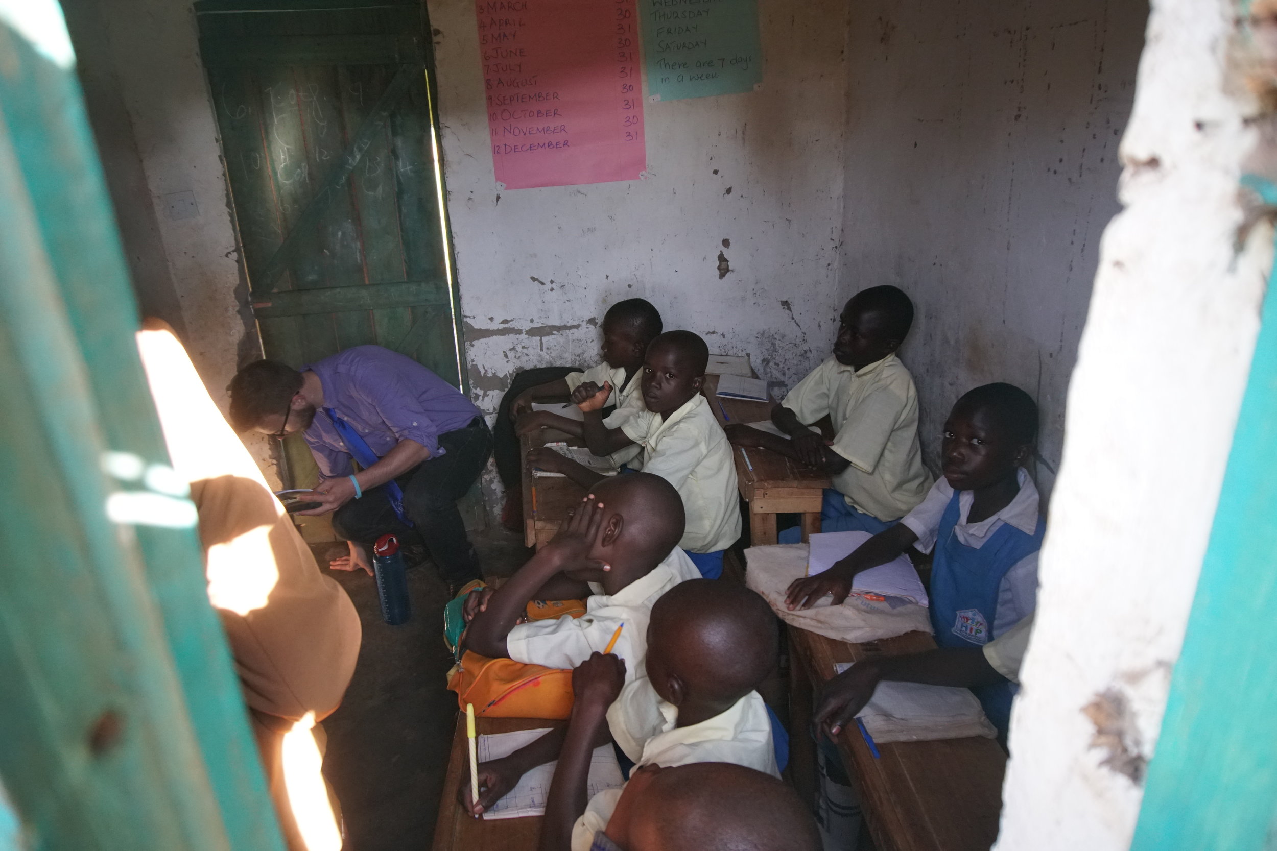  This picture was taken from outside the 3rd grade classroom through the window. From this view, you can see how many students needed to fit at each table, and how little room there was for the students and teachers to be able to move around the room