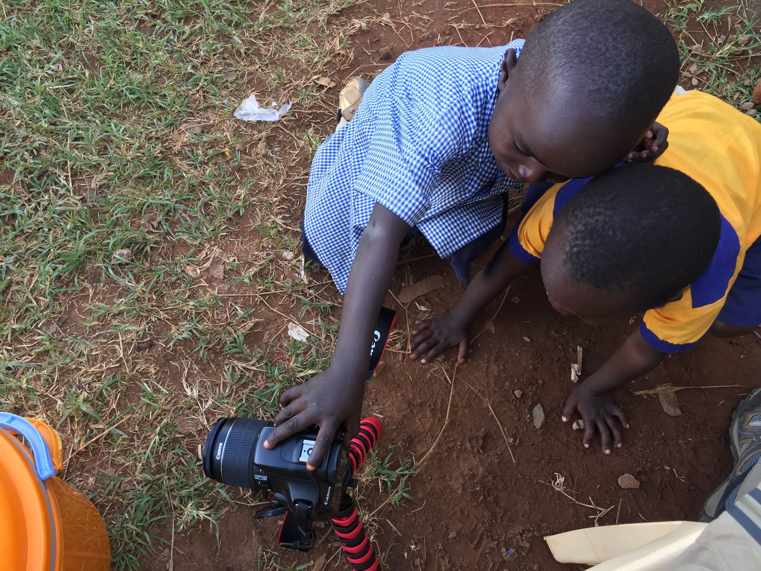 Curious students from the school across the street wanted to see what the HIP team was all about. They came over after our first day of school as we were walking back to Bapa's house, so we showed them some of our camera equipment. They loved being