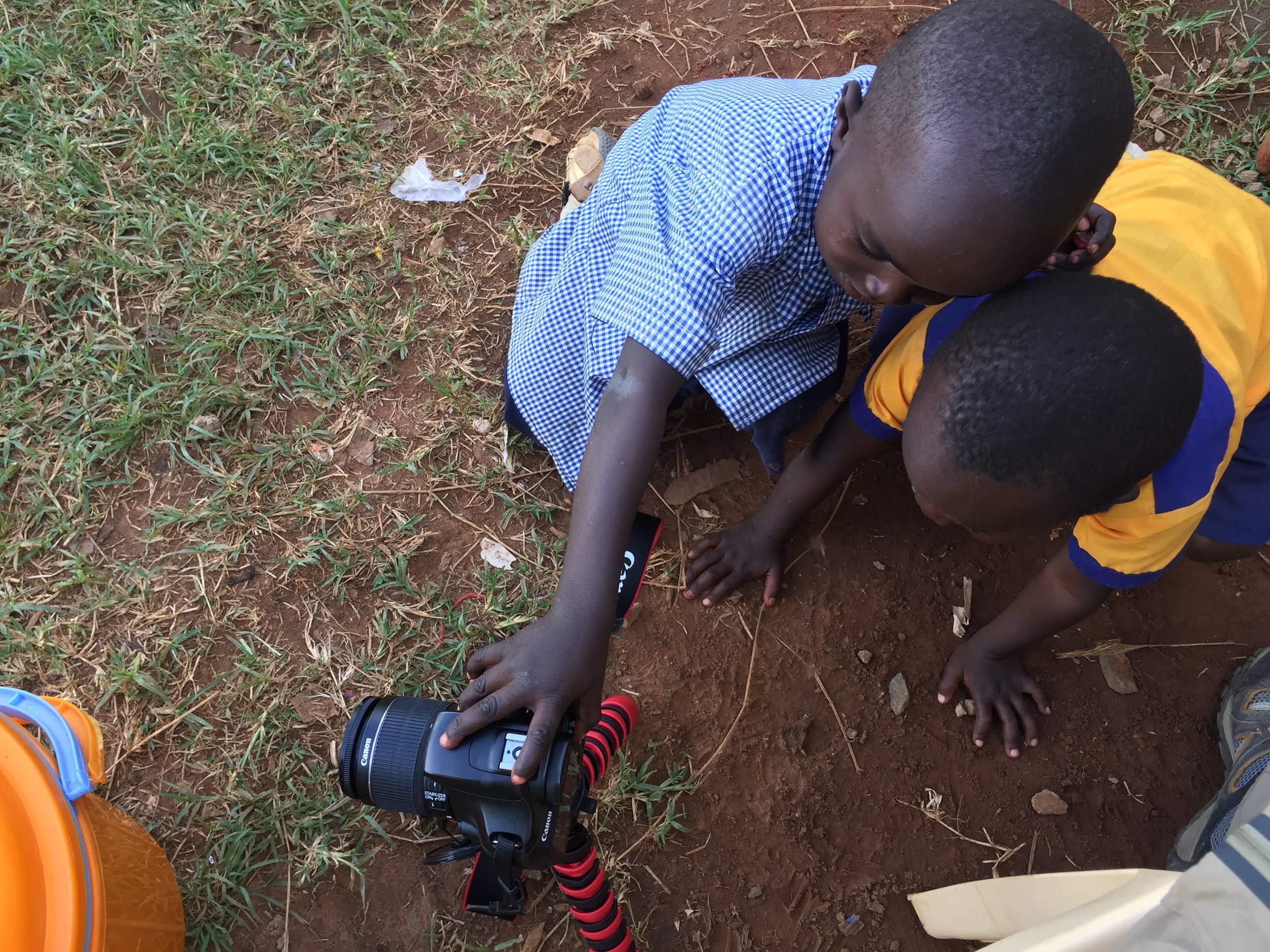  Curious students from the school across the street wanted to see what the HIP team was all about. They came over after our first day of school as we were walking back to Bapa's house, so we showed them some of our camera equipment. They loved being 