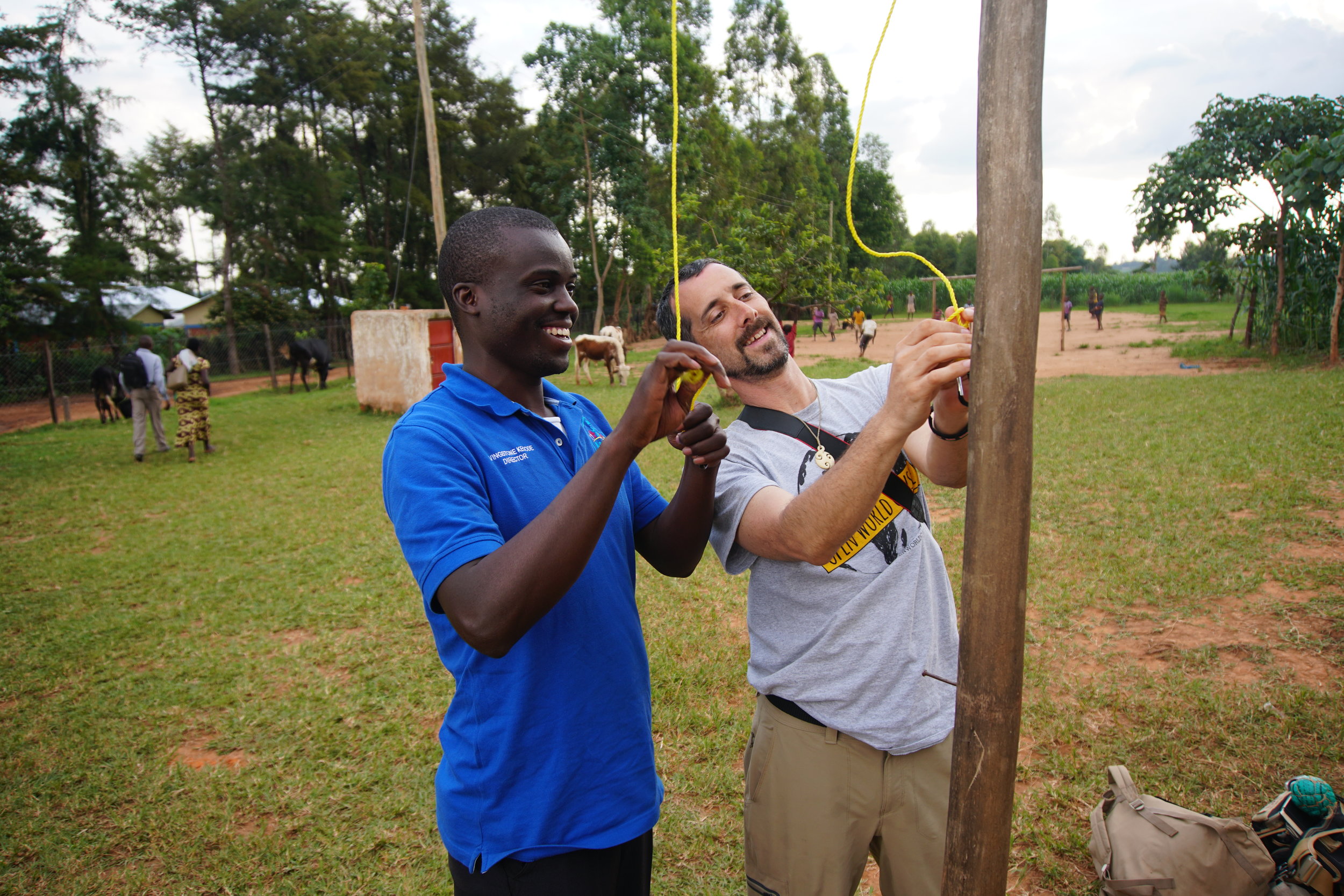 At the beginning of every day, the Kenyan flag would be raised, and at the end of the day, the Kenyan flag would be lowered. John brought with him a carabiner that they rigged to the flag pole to make it easier for HIP's students to be able to raise