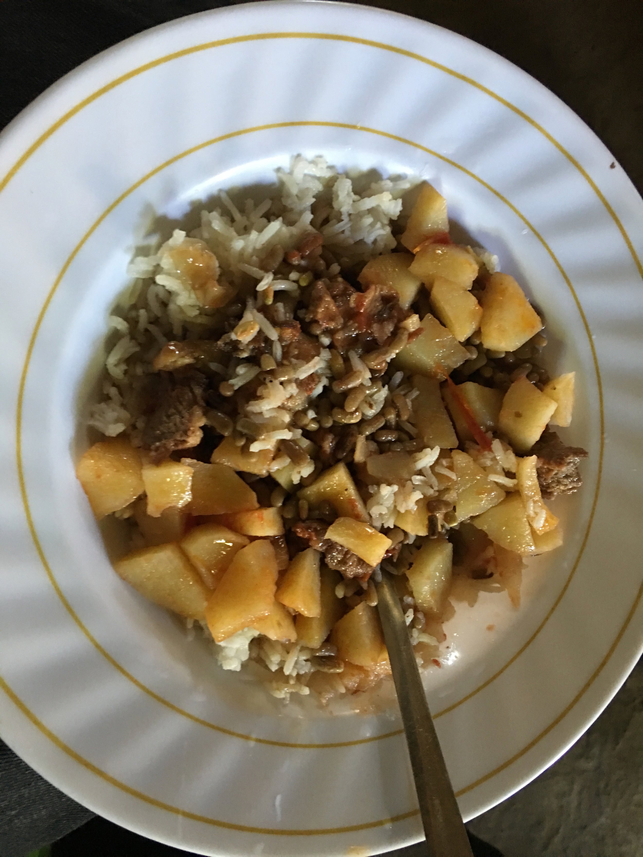  Mama was one of the most amazing cooks that we have ever come across. Even today, we are missing her cooking. This was one of the staples that we had while in Kenya, and it never got old. This dish had rice, beans, potatoes, and meat. 