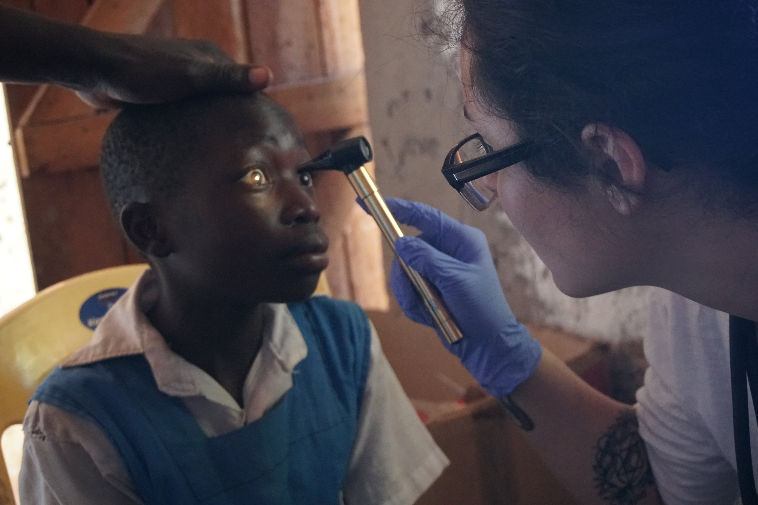 Part of the eye exam included looking into the eyes to check for abnormalities. Fortunately, this student had eyes that looked great!
