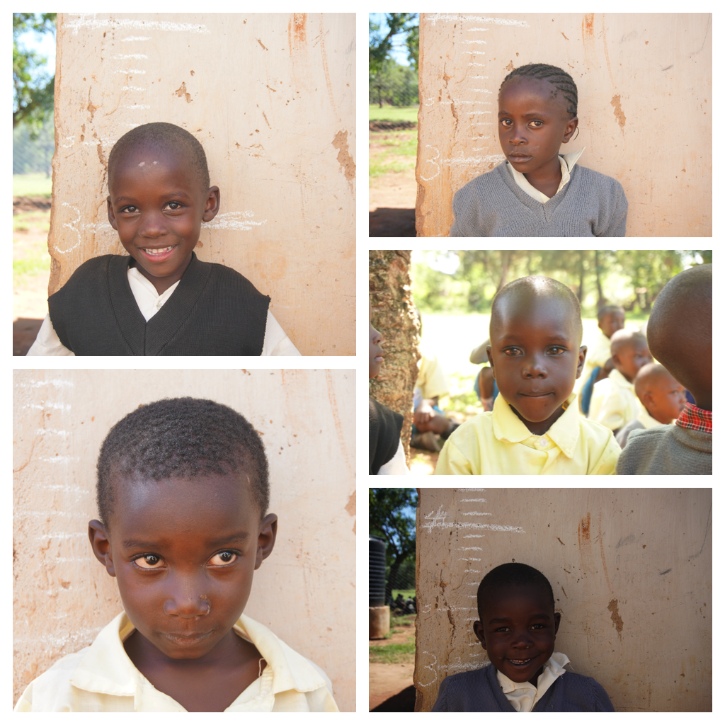  After their exams, students took individual pictures with Brooke and Hunter. These pictures also allowed us to compare their average heights with the average heights of students from Kenya. 