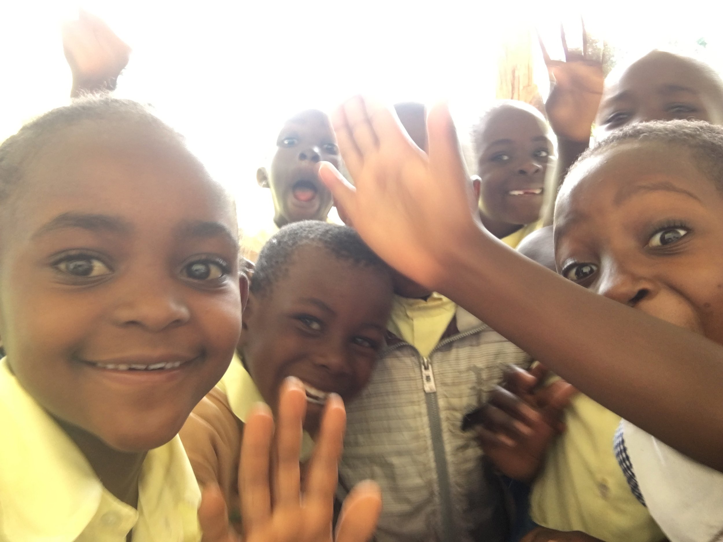 The students learned that our phones had selfie capabilities. This was right after they figured out how to unlock our phones and get the camera app going.