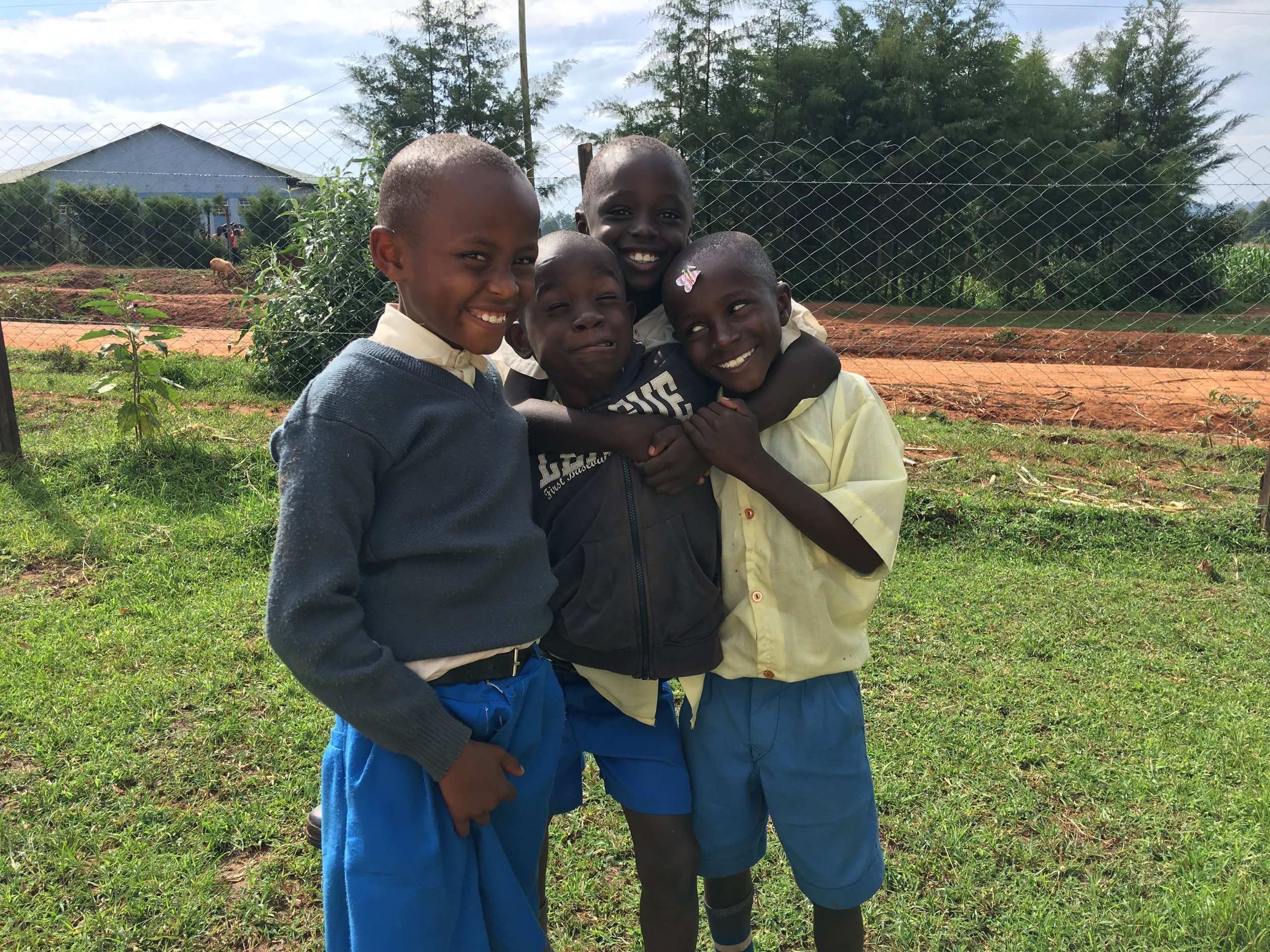 These four boys were great friends. They loved hanging out on the pitch together and making silly faces for pictures.