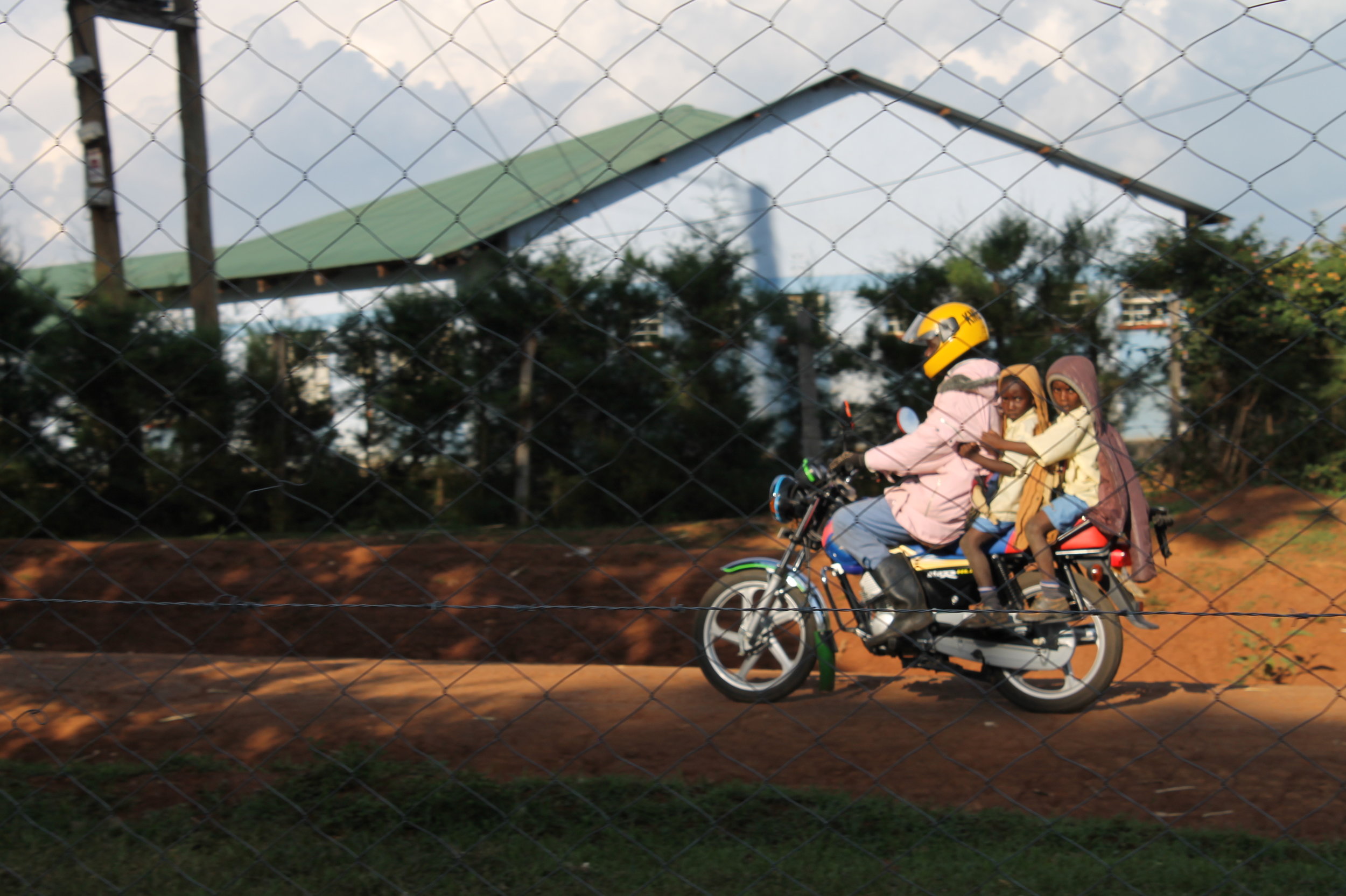 While many students walked to and from school, some students were picked up by moto.