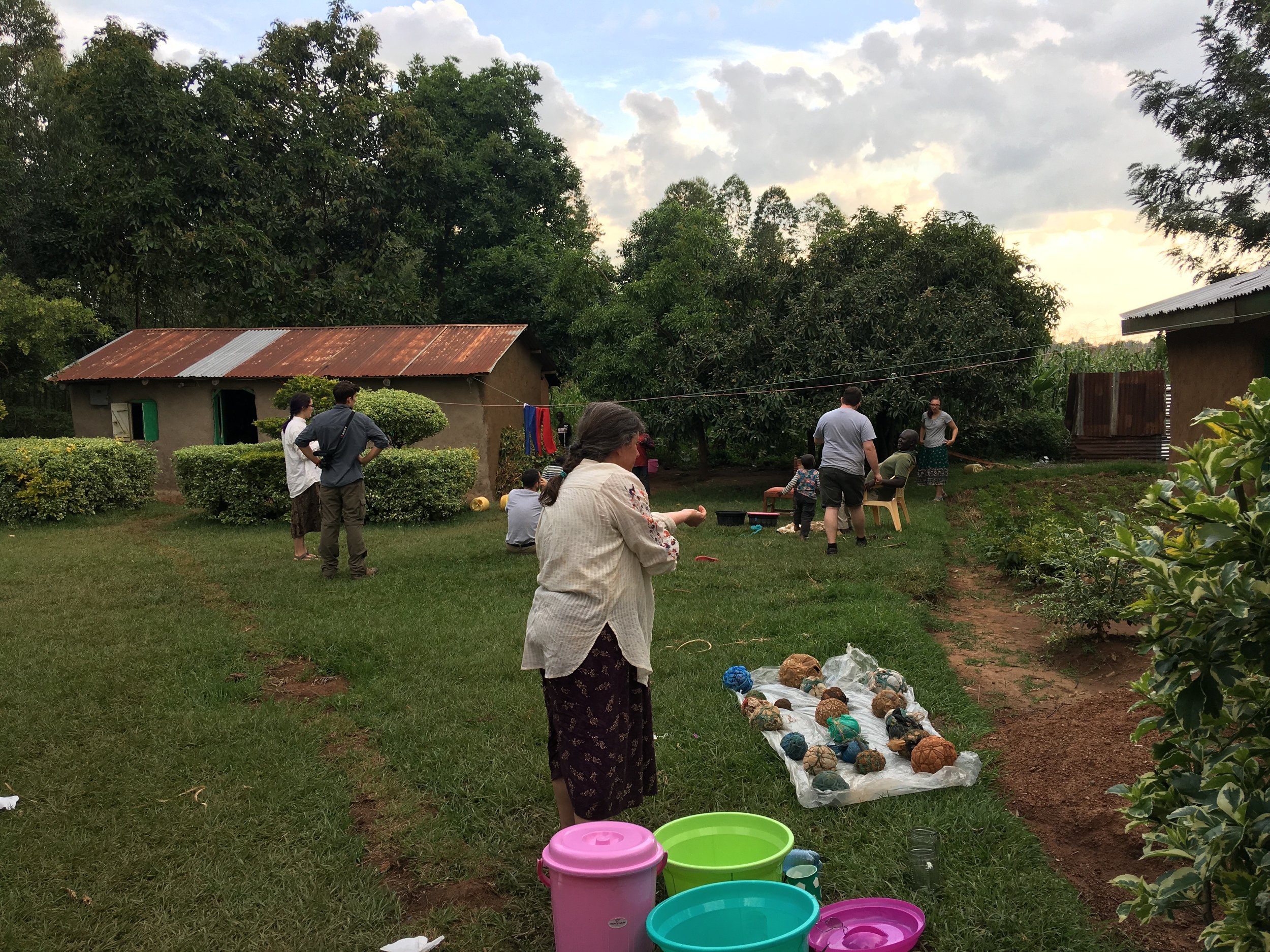  Melissa lays out the trash balls after her trade with the children of the community. 