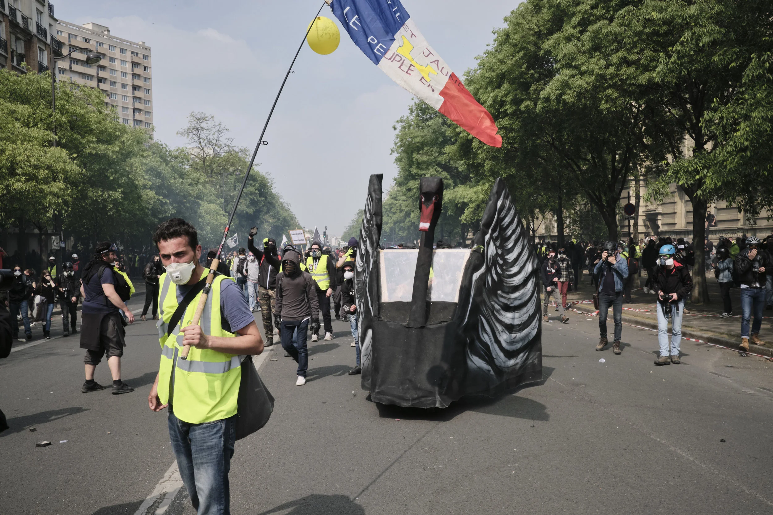 Protest participants marching towards The Place D’italie.