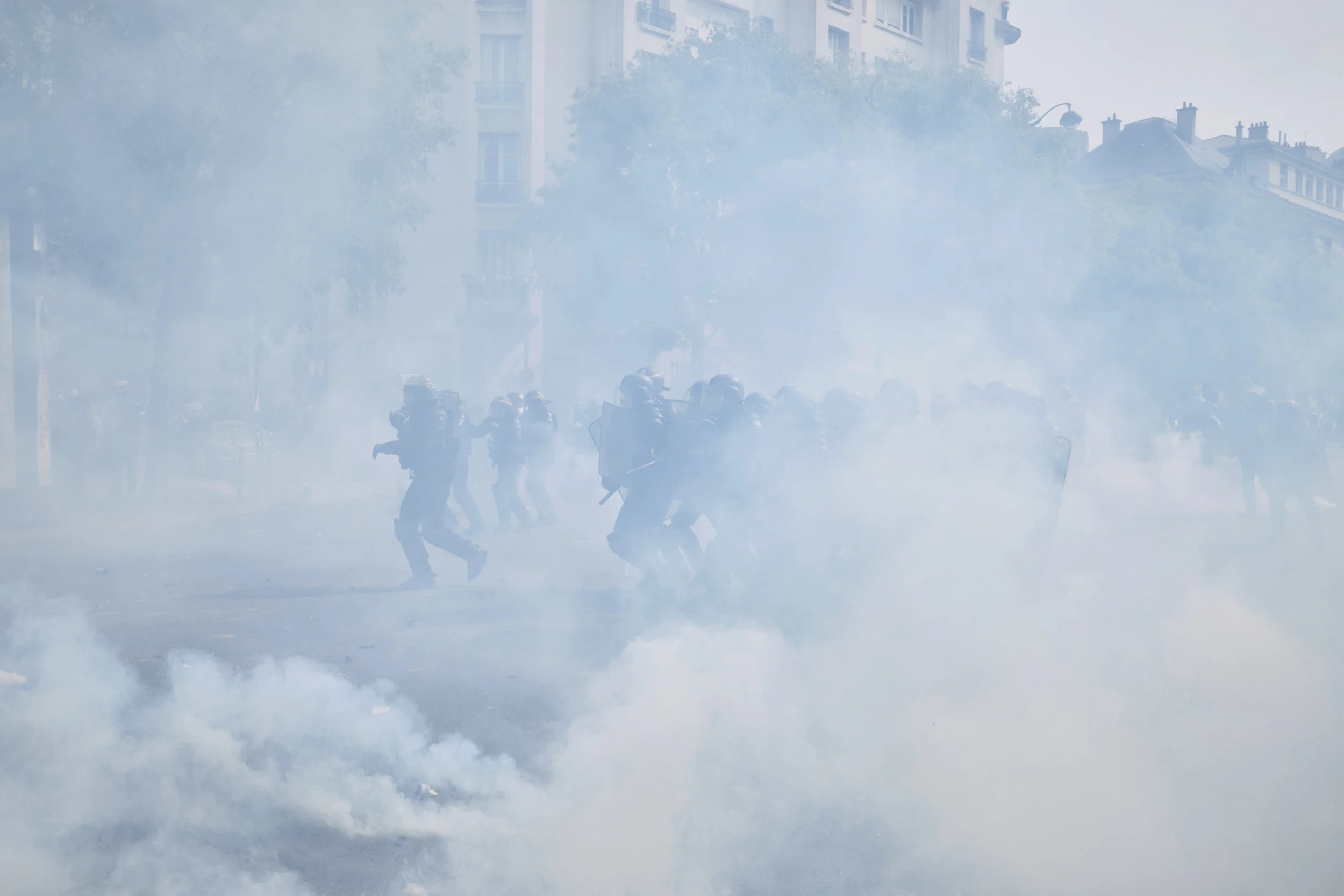 Riot police pushing the crowd of protesters further into The Avenue des Gebelins in order to disperse the blockade.