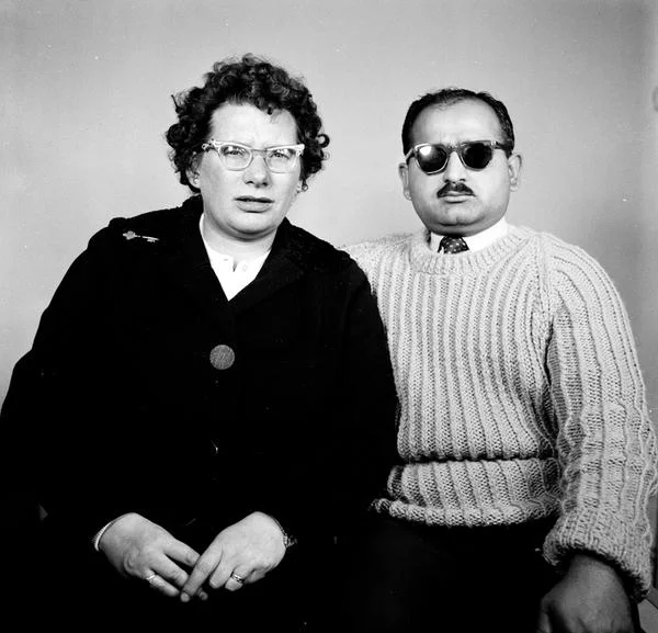 Late 1950s. Home visit Wolverhampton. Family name: Khan, bus conductor. They had one daughter. Later they divorced and he moved to Canada, and left the house to his daughter.