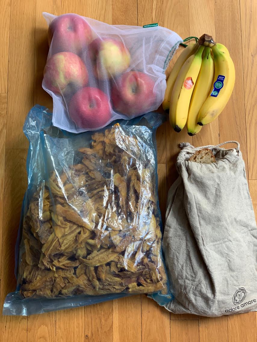 These mangos are in the plastic bag Whole Foods uses to fill their bulk bins.