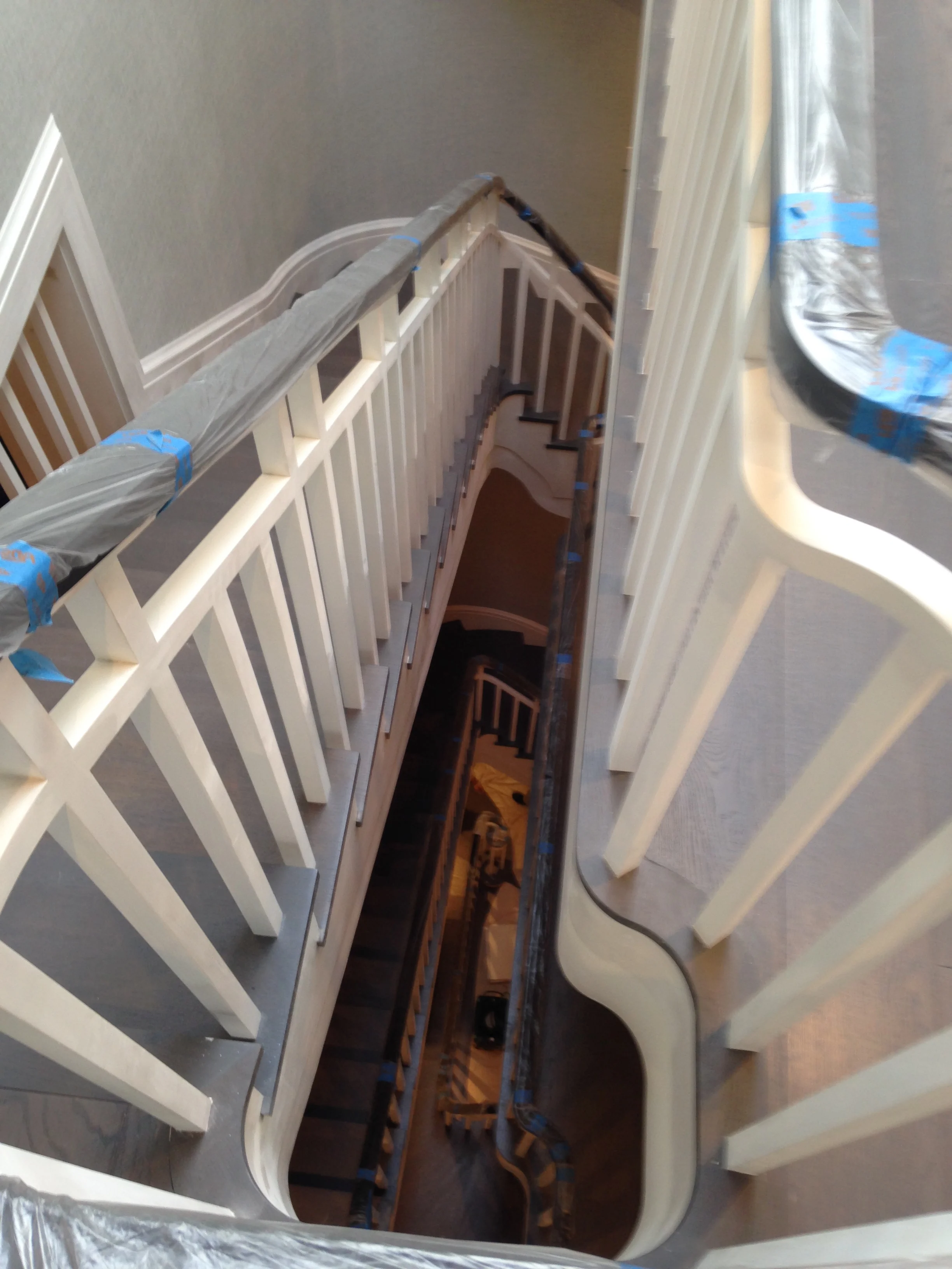 Don't look down: Five flights of this custom curved staircase.