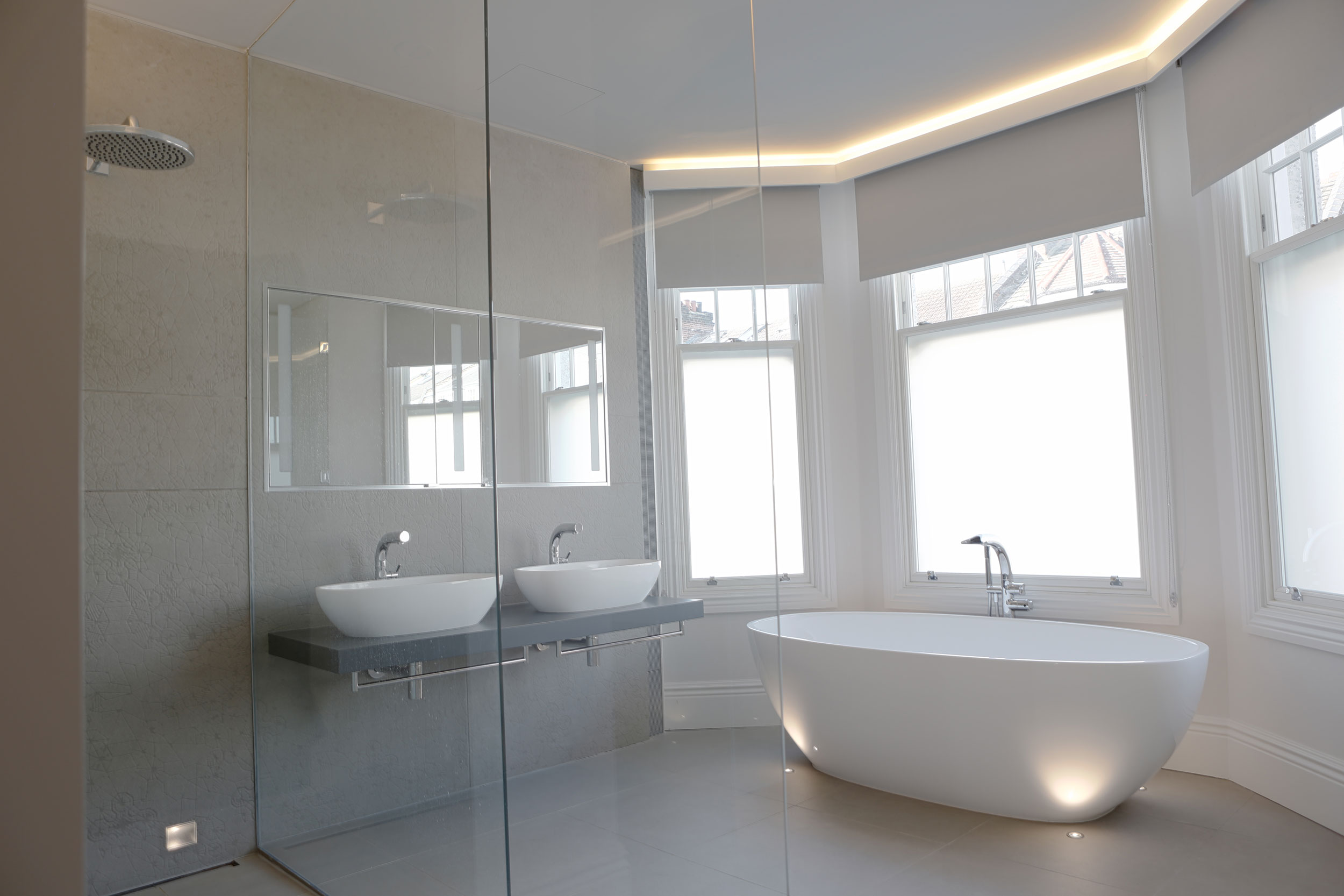 ambigramarchitects_BelsizePark2_masterbathroom.jpg