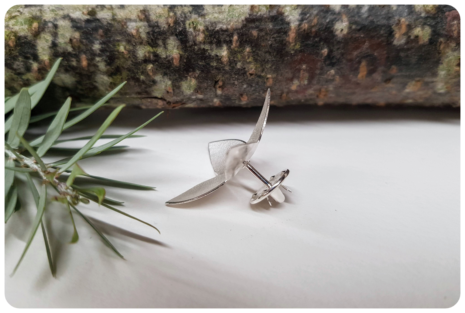 side pyrus flower lapel.png