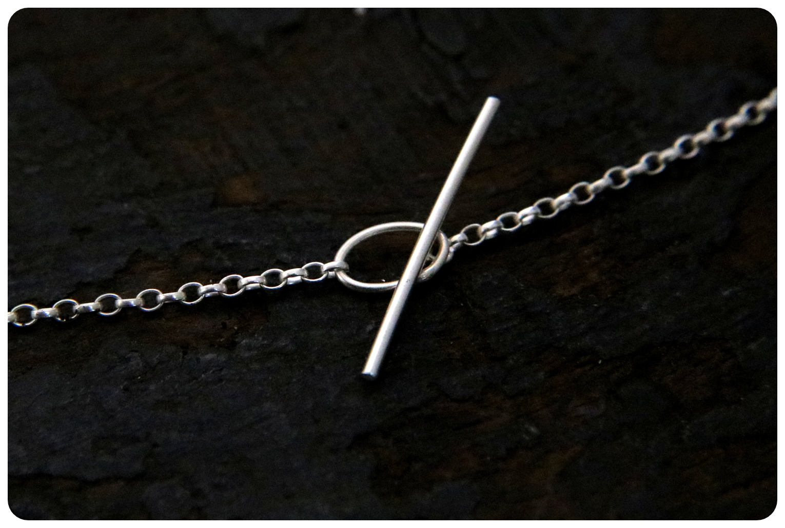 silver oval catch.png