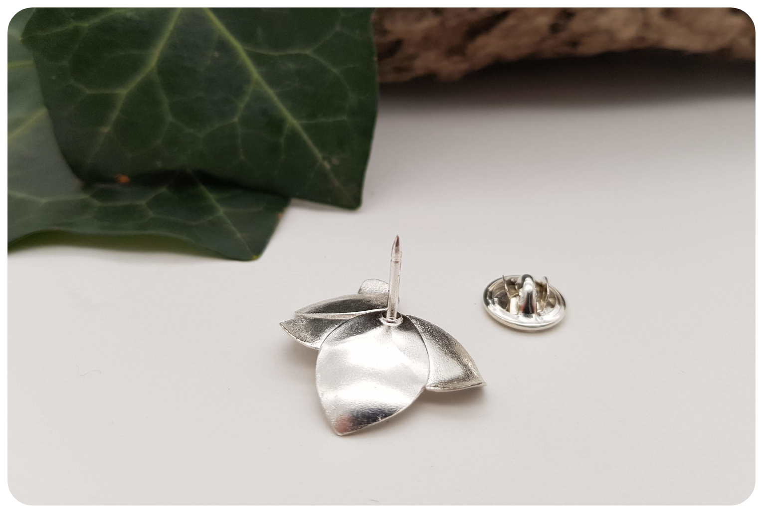 back orchid foliage lapel pin.png