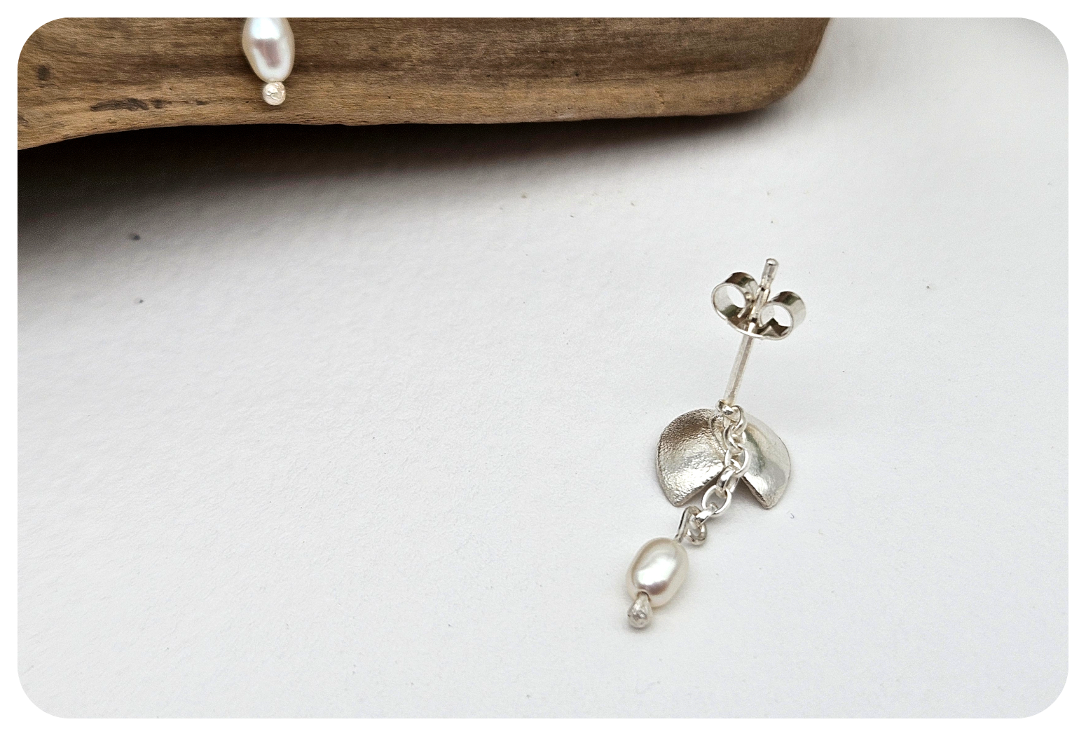 small double orchid petal pearl earrings.png