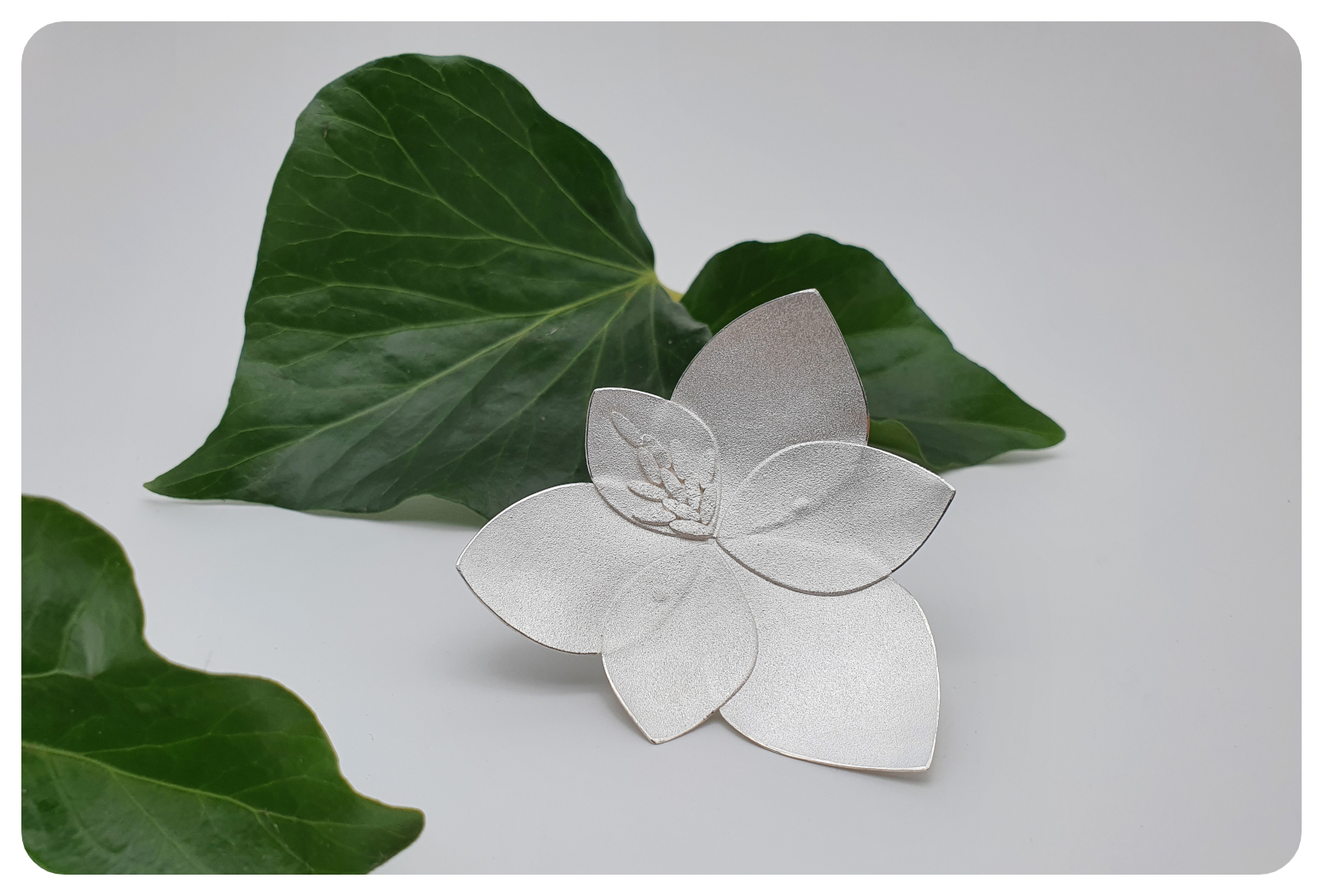 floral foliage brooch.png
