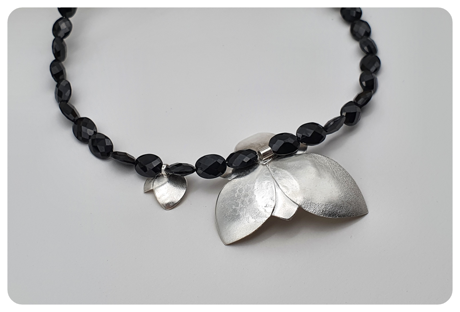 back floral foliage spinel neck.png