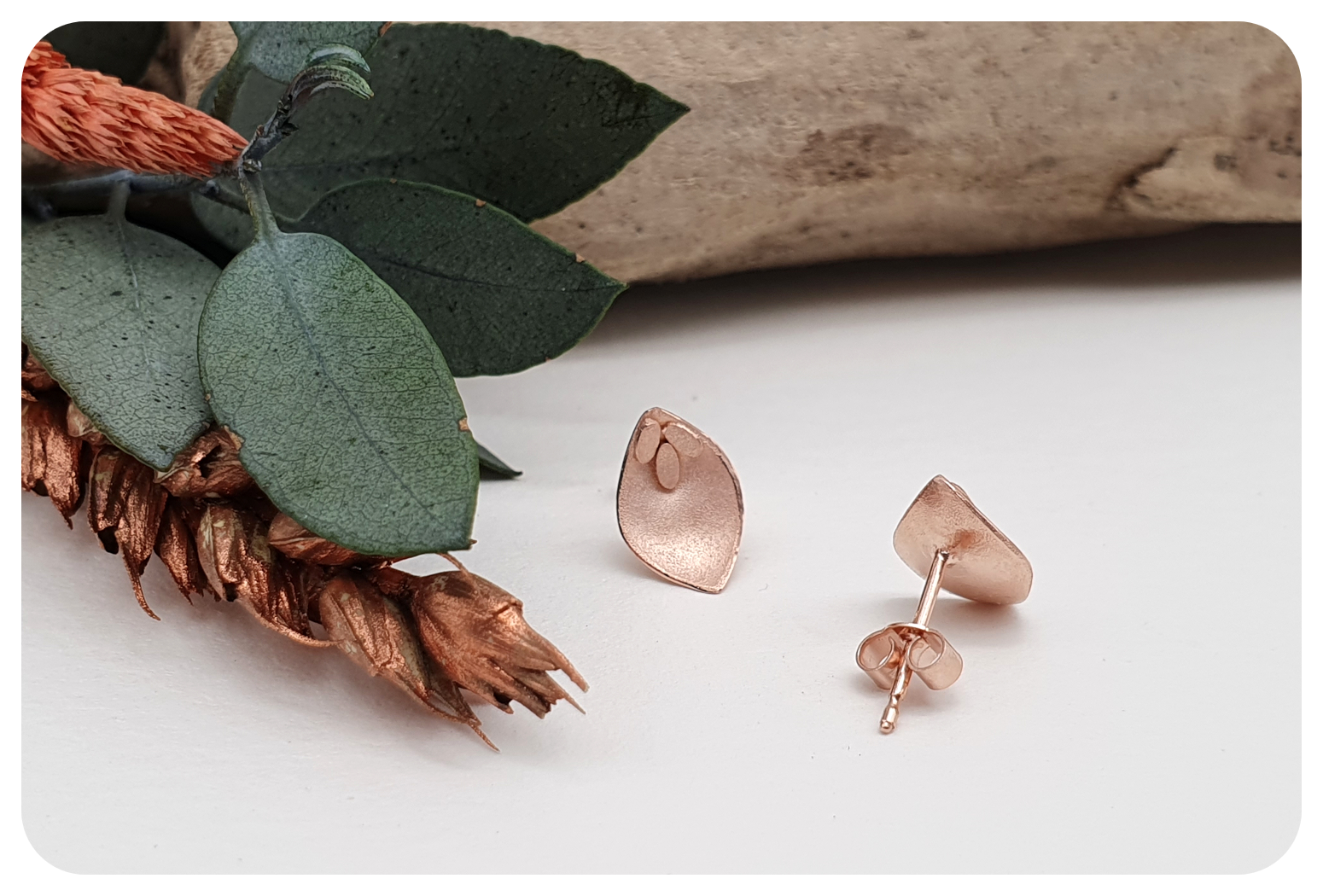 sm rose foliage earrings back.png