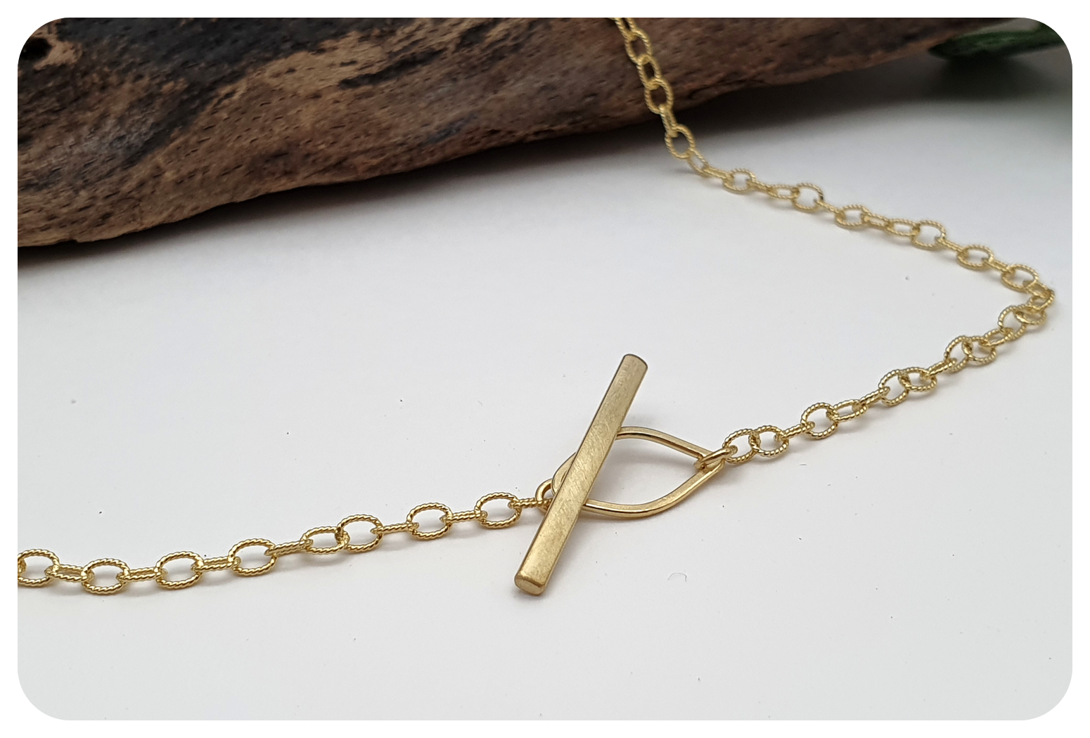 gold orchid fancy chain catch.png