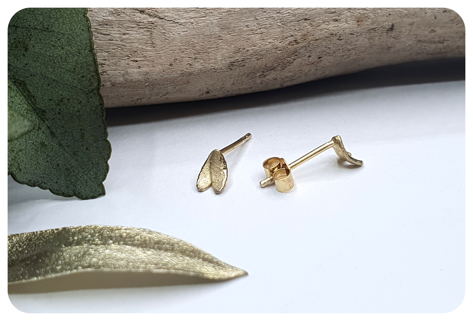 tiny gold double petal studs back.png