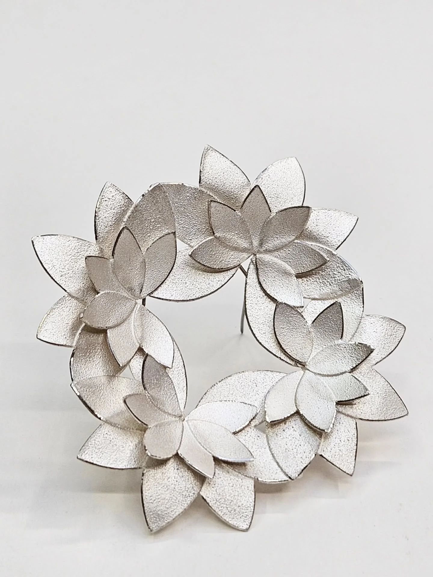Inflorescence' Brooch
As we are celebrating 20 years of open studios this year, here @coburghouse the jewellers have been busy making special pieces to be included in our '20 Brooches' exhibition. 

Like most of my pieces, this brooch is handmade by 