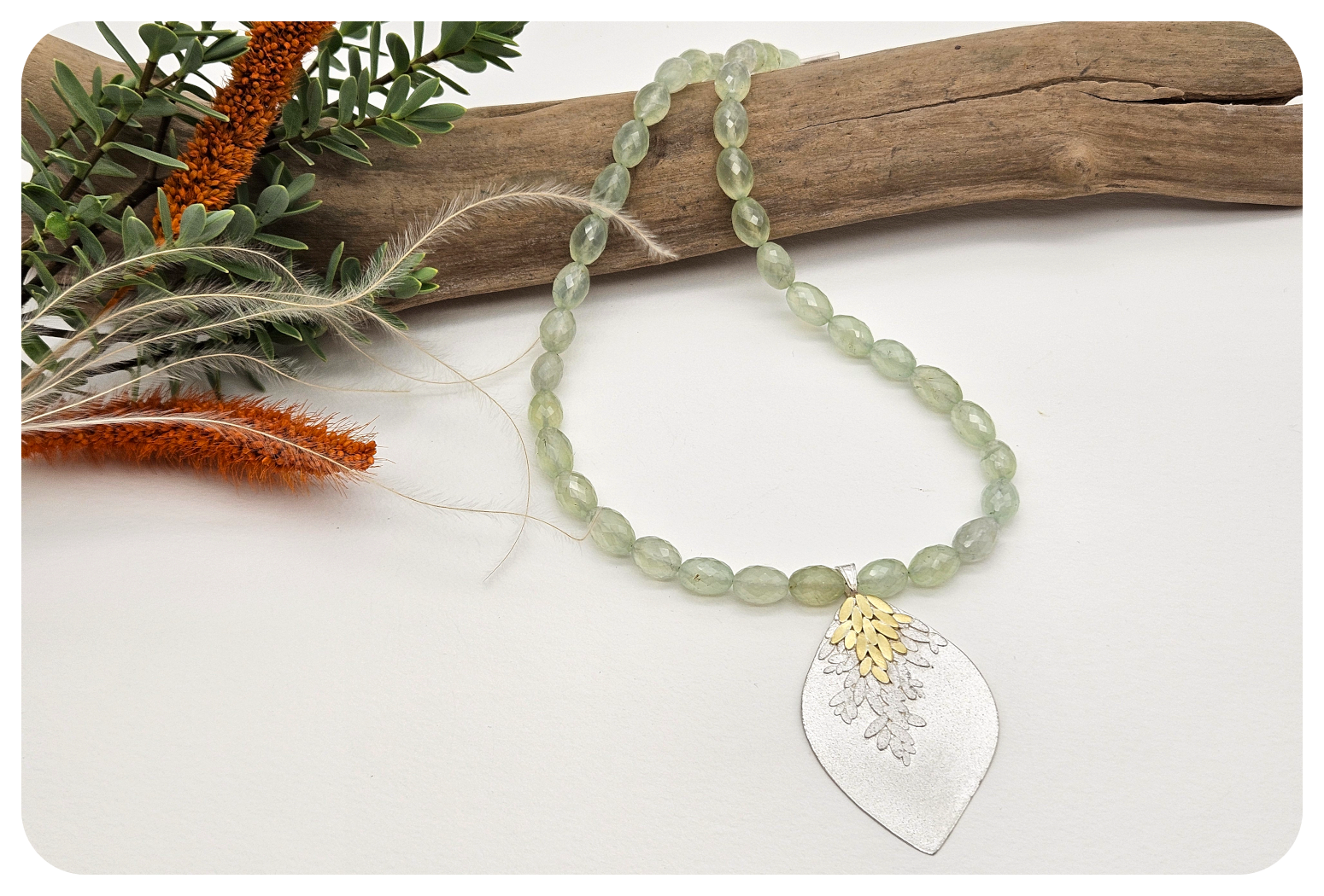 silver and gold foliage necklace 4.png