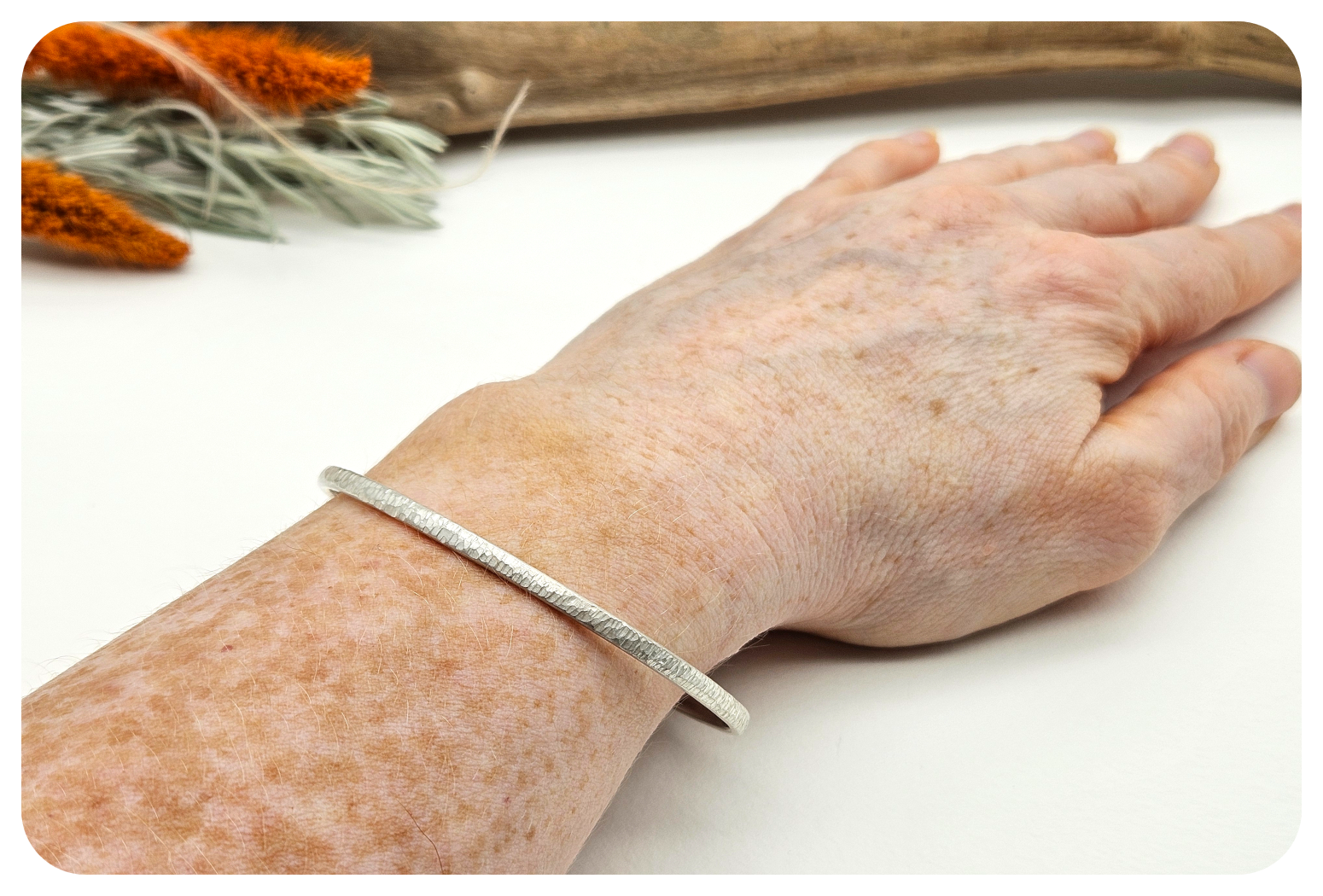 slim oval woodland bangle on.png