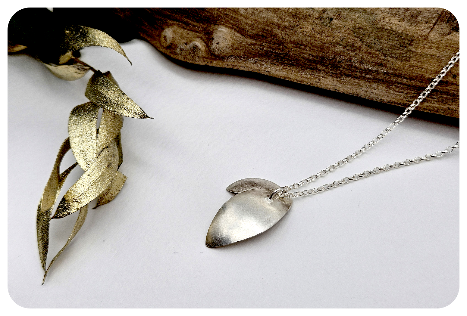 large euc petal pend with leaf detail back.png