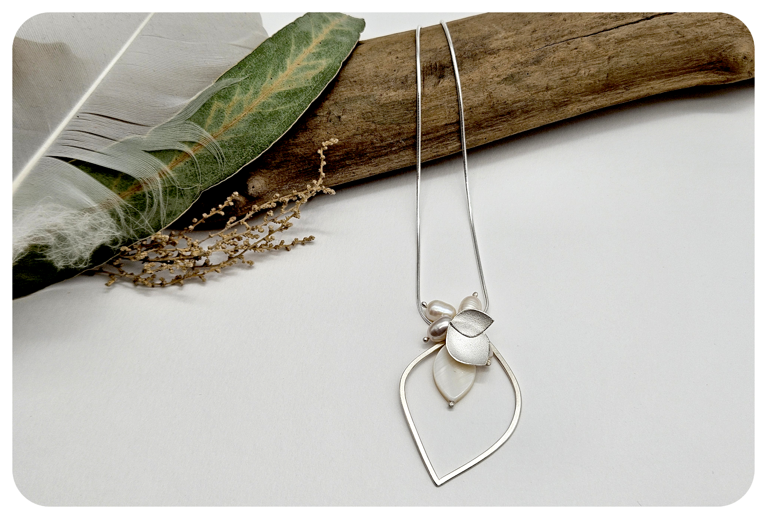 orchid petal and pearl loop pend.png