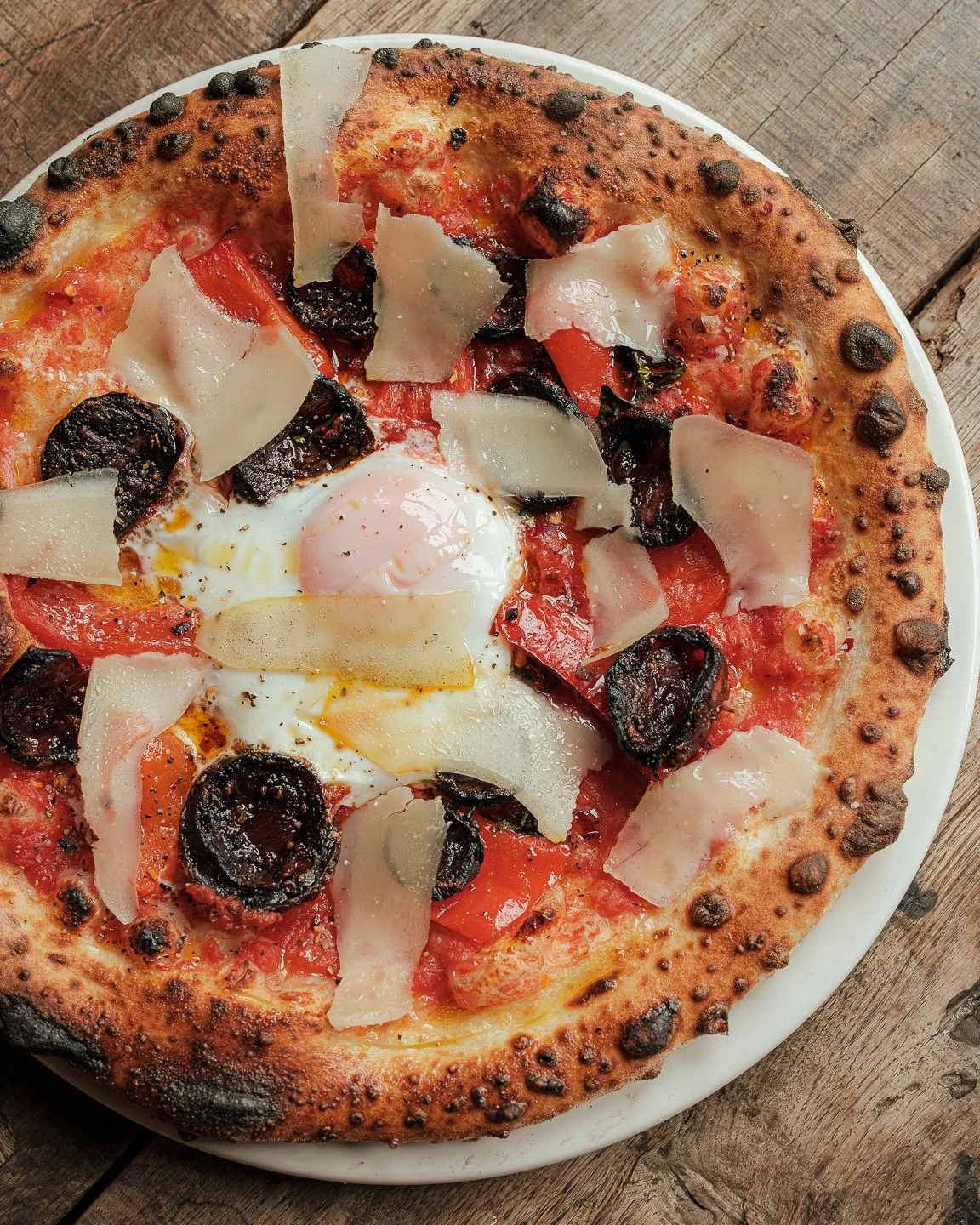 Taking you to Spain with this week's special, it's loaded with Morcilla Sausage, Roasted Red Peppers, a lovely egg in the middle and finished with Parmesan shavings. Definitely up there with one of the best pizza specials to come out of the kitchen i