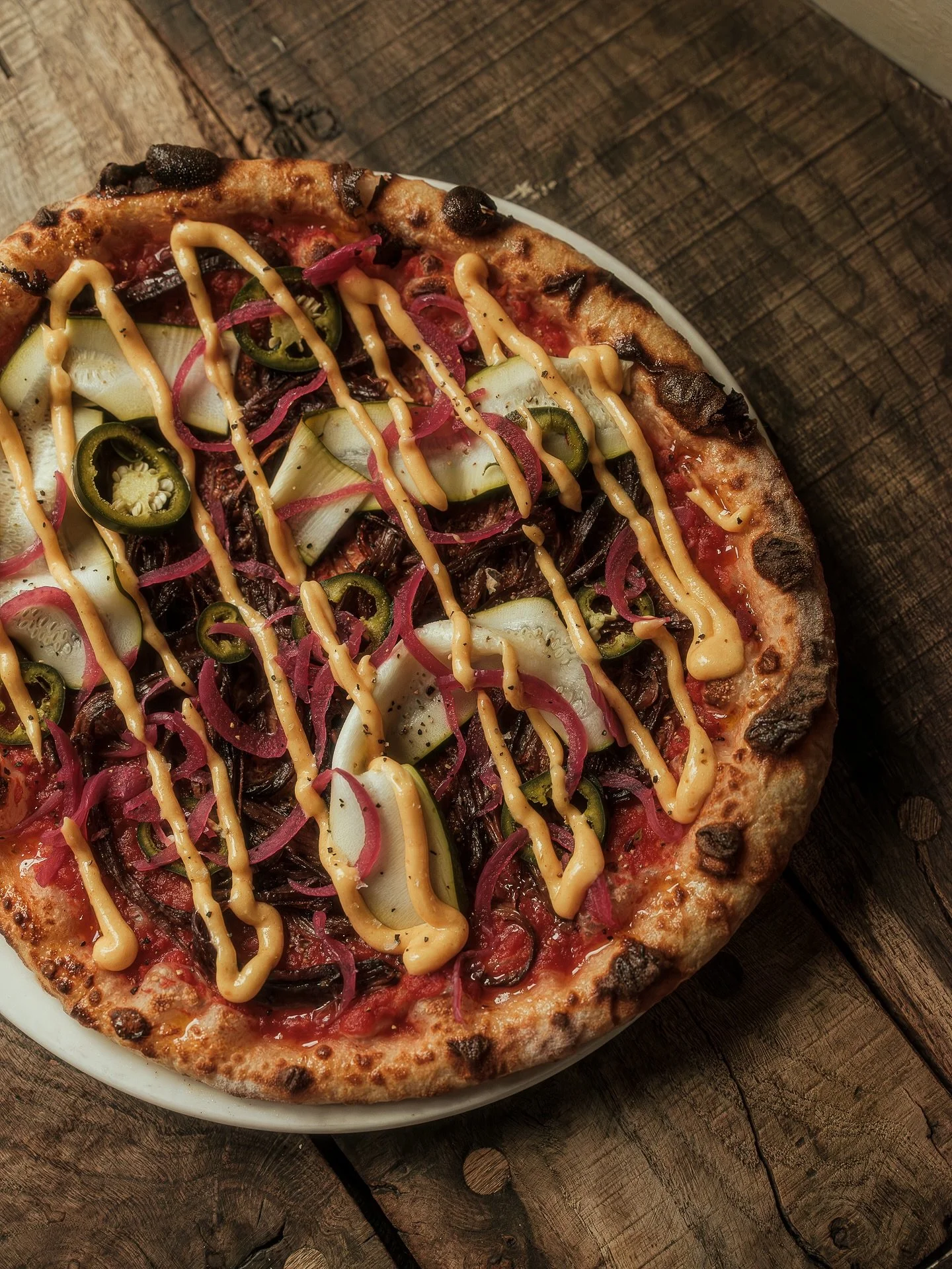 All over this pizza special from @joshredgewell on the board at the moment. Beef Brisket that he brined and then cooked overnight, joined by a selection of pickled Q&rsquo;s, red onion and jalape&ntilde;os, and then finished with a @saltpigcuring Ndu