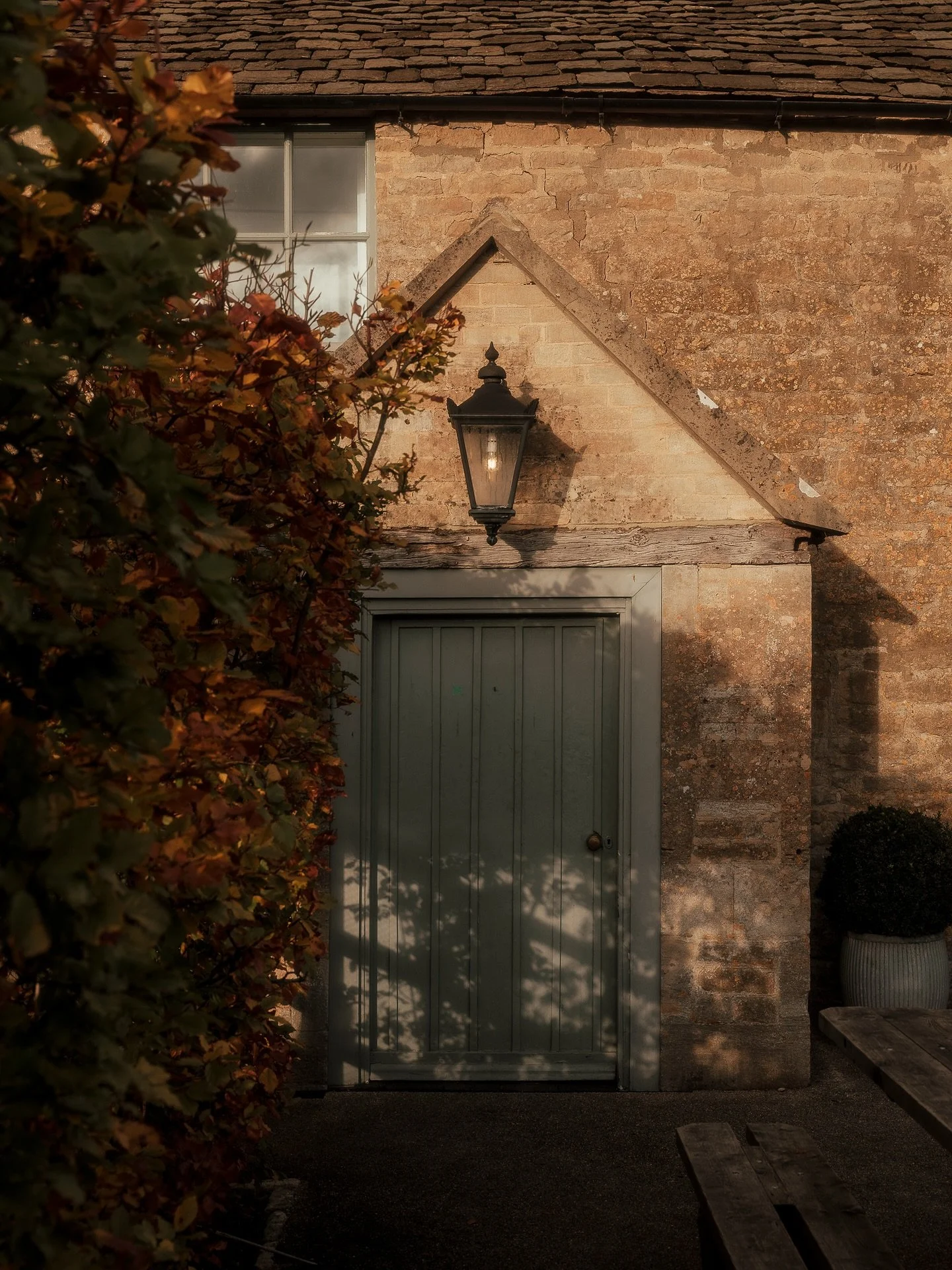 Cotswold stone, Autumn leaves, and the comfort of an old pub.