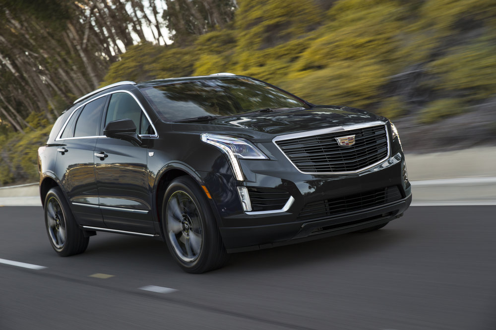 The 2019 Cadillac XT5 Sport package is infused with darkened ext