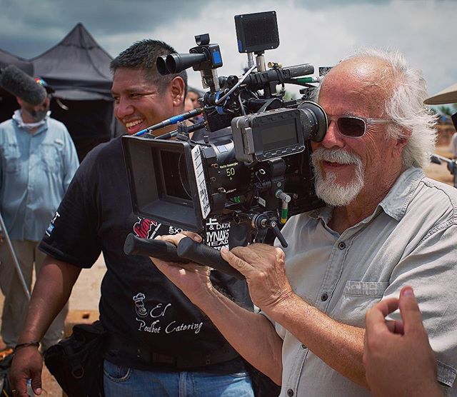 Maestro Cinematographer Reynaldo Villalobos operating the camera in the scorching desert.