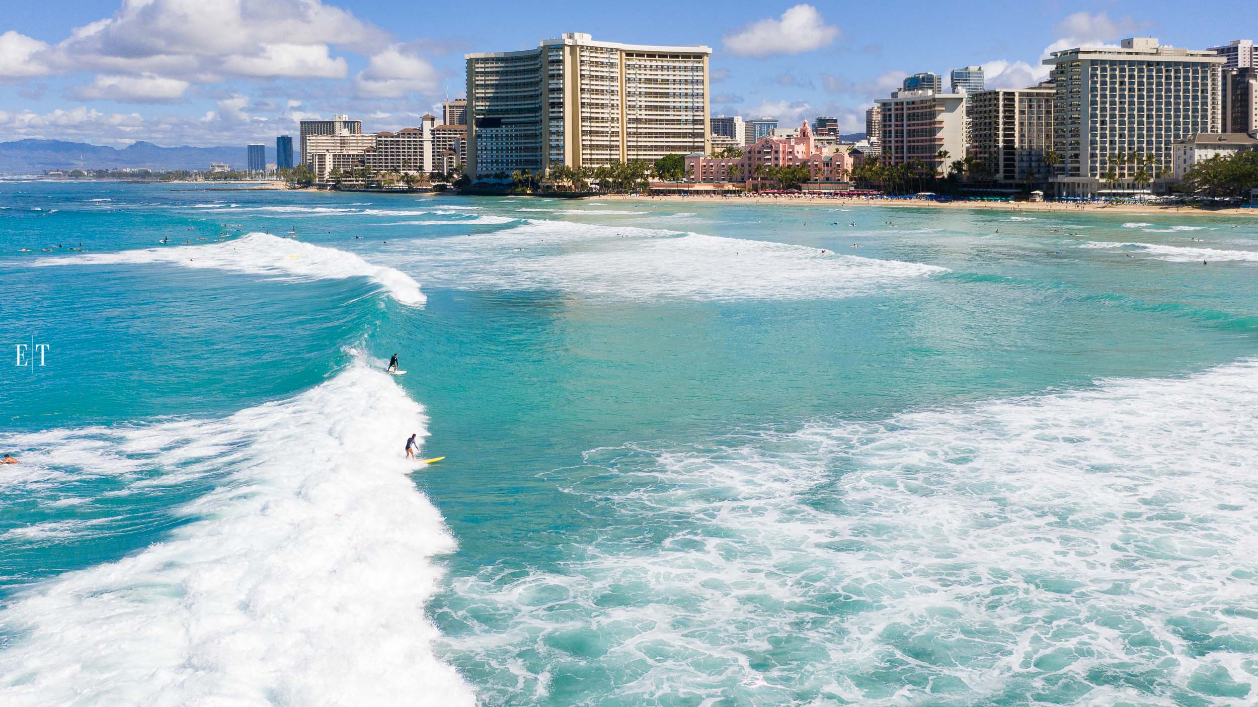 Two surfers, Waikiki Beach