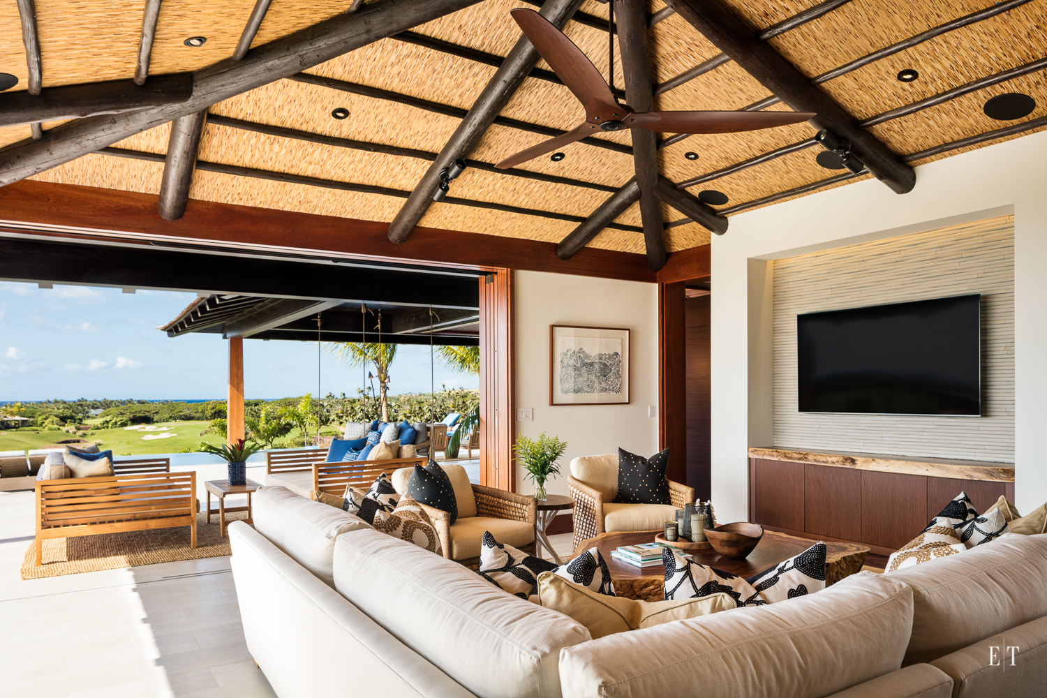  Indoor Outdoor living at its finest at Hale Kahakai, Kukui’ula on the South Shore of Kauai - Pu’uwai Design + Build | Photography by Ethan Tweedie 